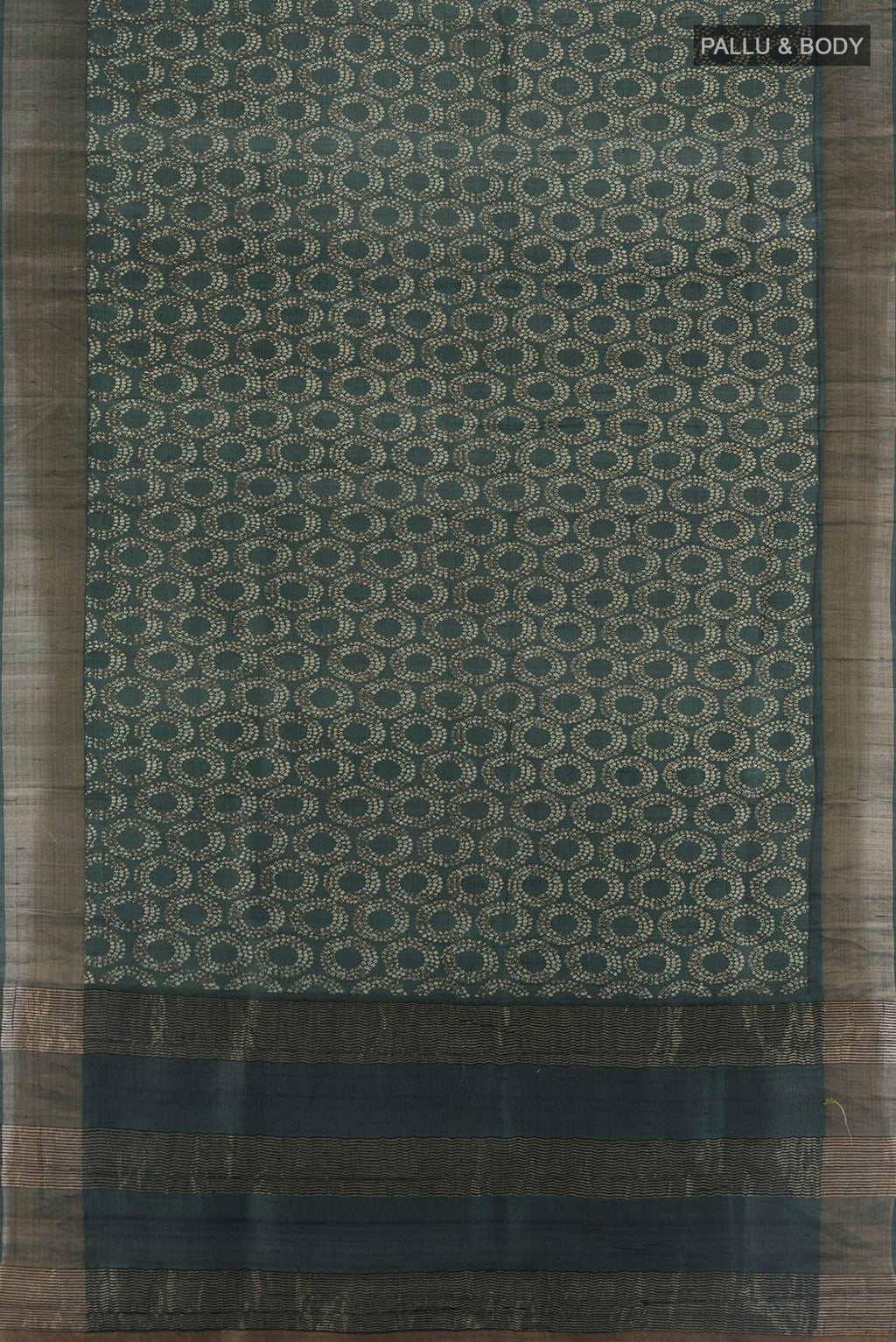 Flat view of Bottle Green Tussar Silk Saree with Floral Print on the body and Zari Border. 