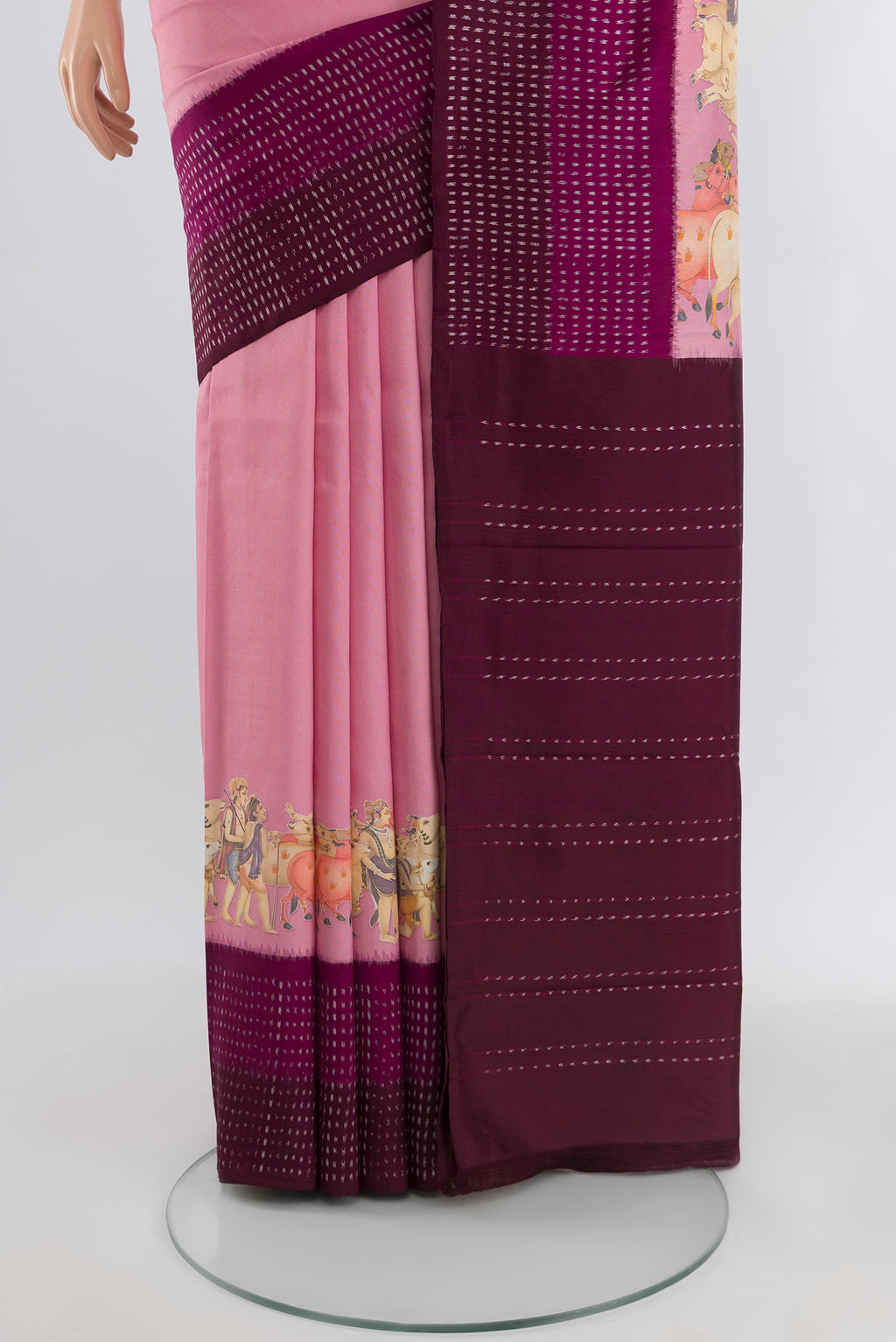 Pleats and pallu of Rose pink Tussar Silk Saree with Plain Body and Printed Border. 