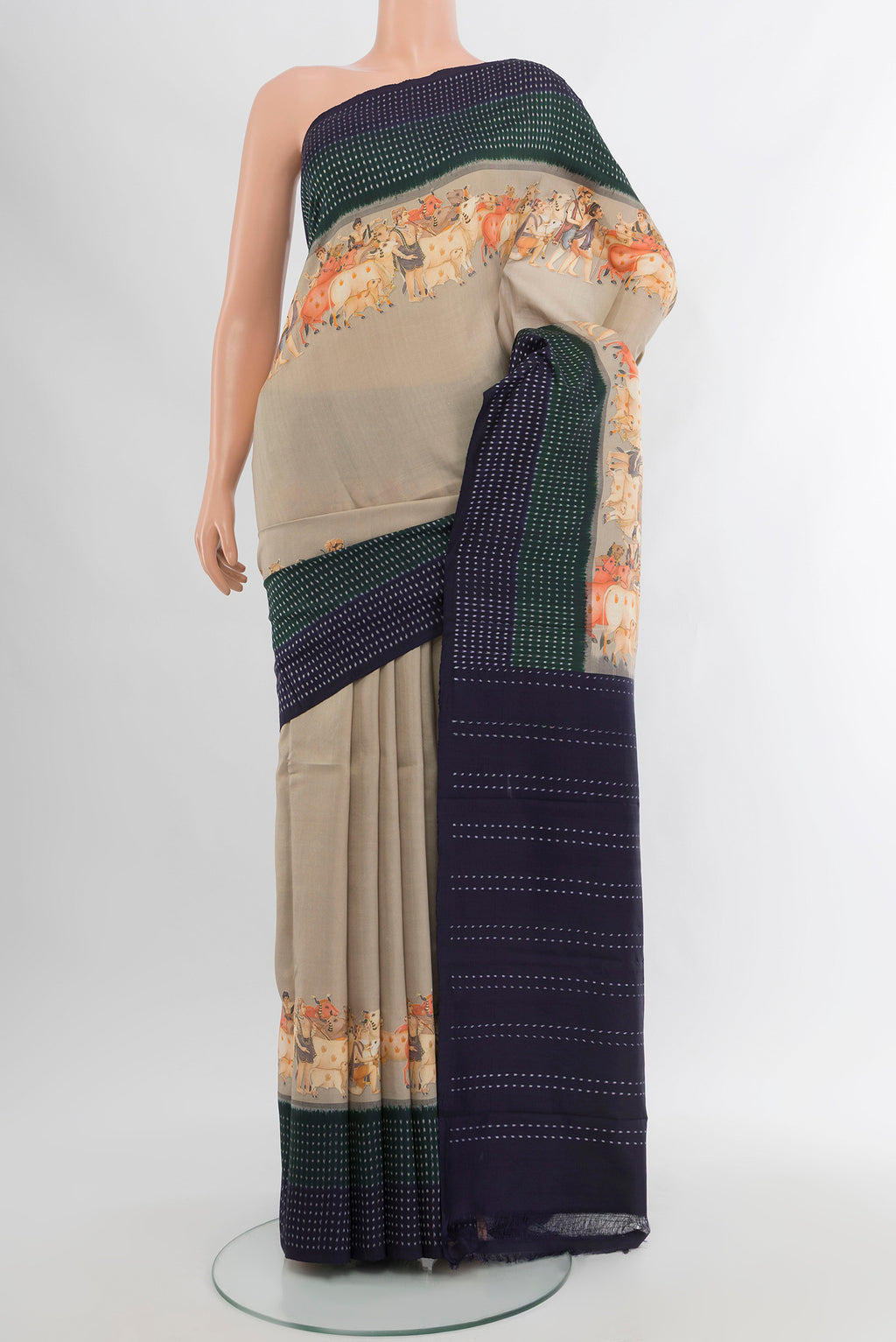 Beige Tussar Silk Saree with Plain Body and Printed Border.  displayed on a mannequin