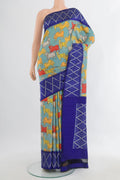 Pure Silk Light Blue Printed Saree with Printed design on the body and Ikat Border.  displayed on a mannequin