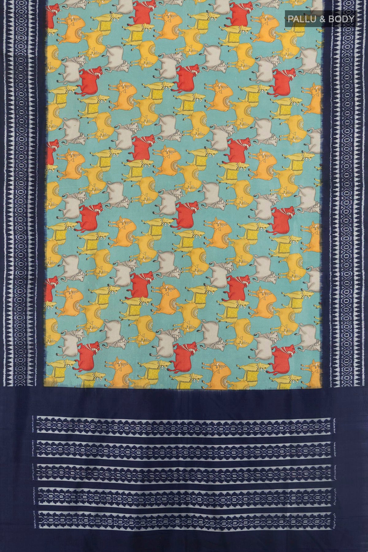 Flat view of Pure Silk Light Blue Printed Saree with Printed design on the body and Ikat Border. 