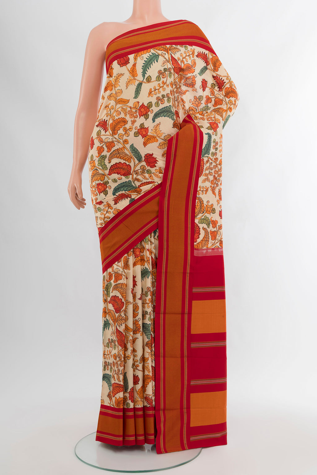 Beige Printed Silk Saree with Floral Print on the body and Plain Border.  displayed on a mannequin