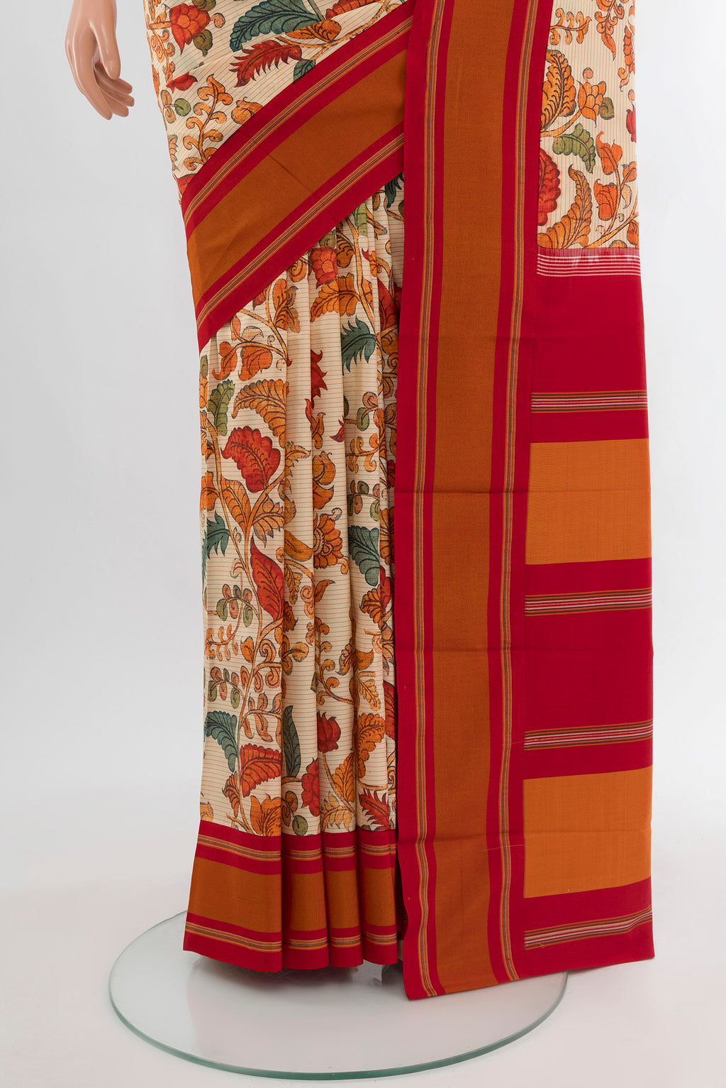 Pleats and pallu of Beige Printed Silk Saree with Floral Print on the body and Plain Border. 