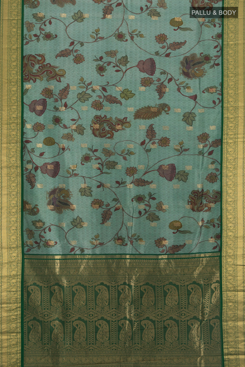Flat view of Green Printed Silk Saree with Floral Print on the body and Zari Border. 
