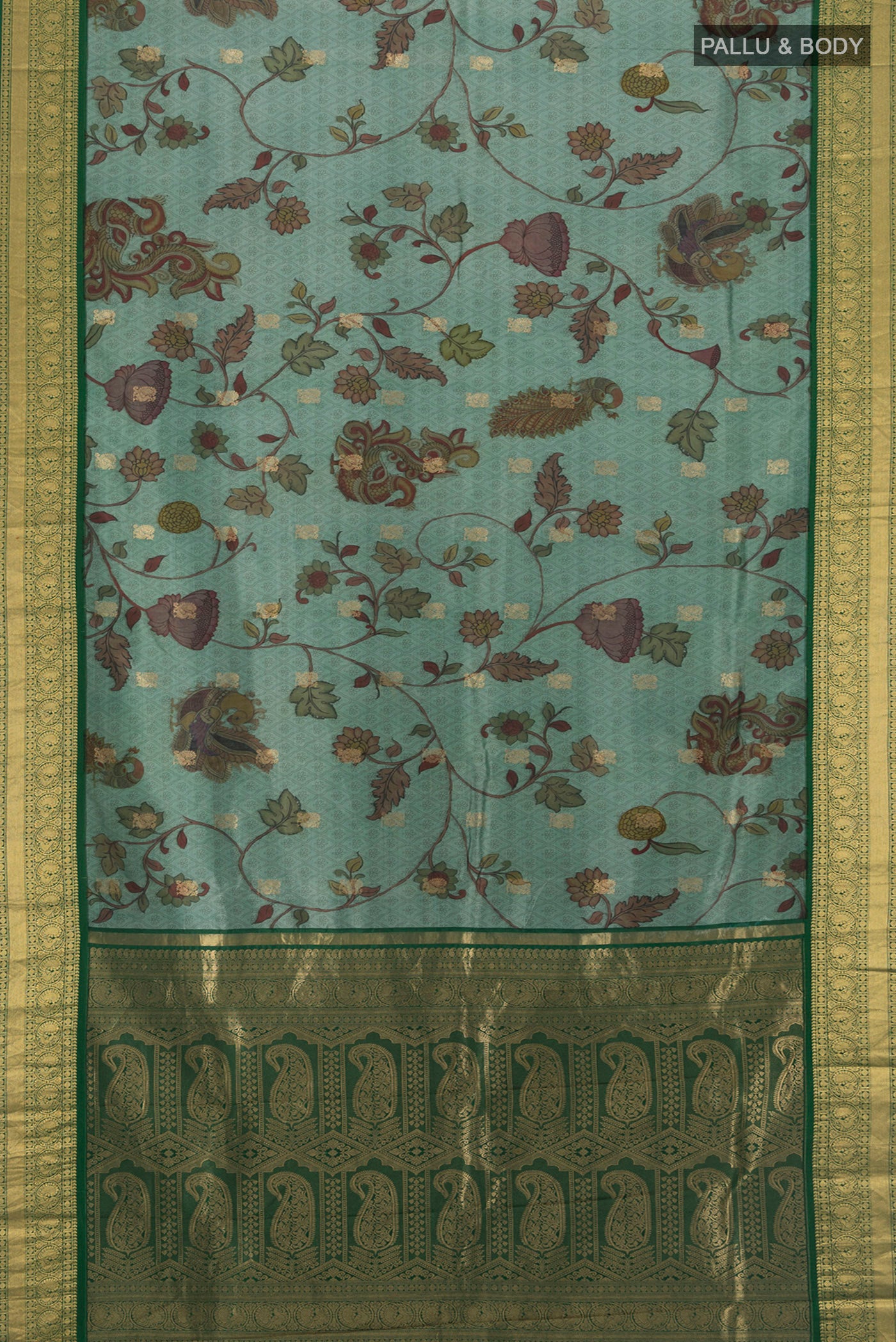 Flat view of Green Printed Silk Saree with Floral Print on the body and Zari Border. 