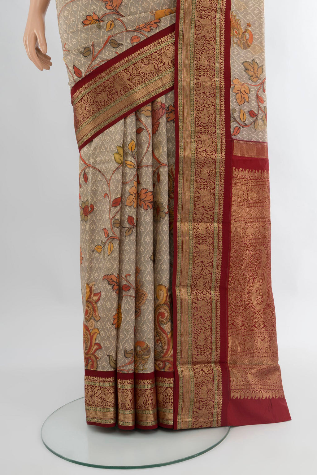 Pleats and pallu of Beige Bangalore Silk Saree with Floral Print on the body and Zari Border. 