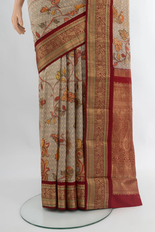 Pleats and pallu of Beige Bangalore Silk Saree with Floral Print on the body and Zari Border. 