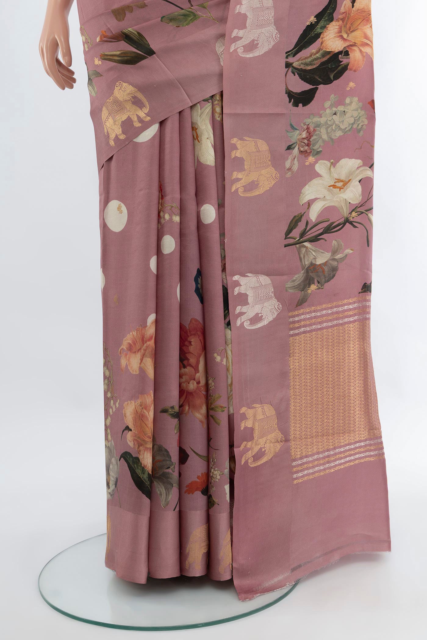 Pleats and pallu of Mauve Banarasi Katan Silk Saree with Floral Print on the body and Fancy Border. 