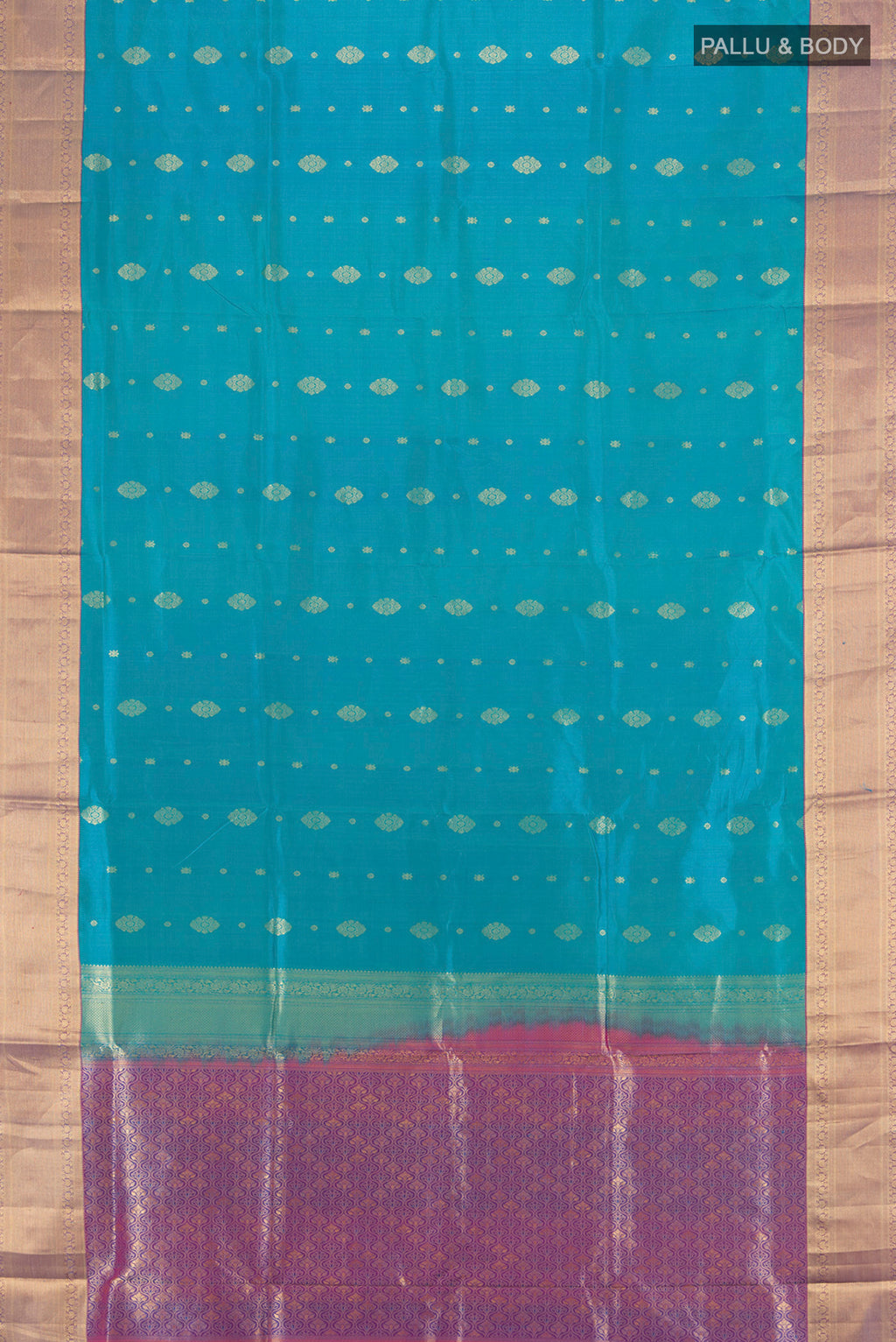 Flat view of Light Blue Soft Silk Saree with Zari Butta on the body and Zari Border. 