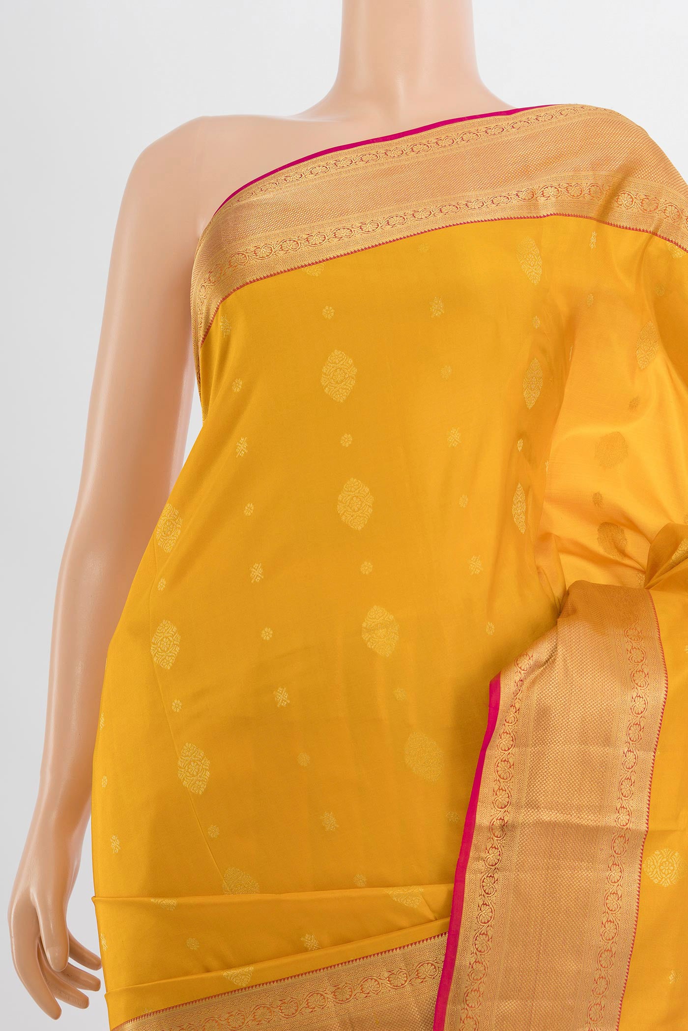Border image of Mustard Soft Silk Saree with Zari Butta on the body and Silk Border. 