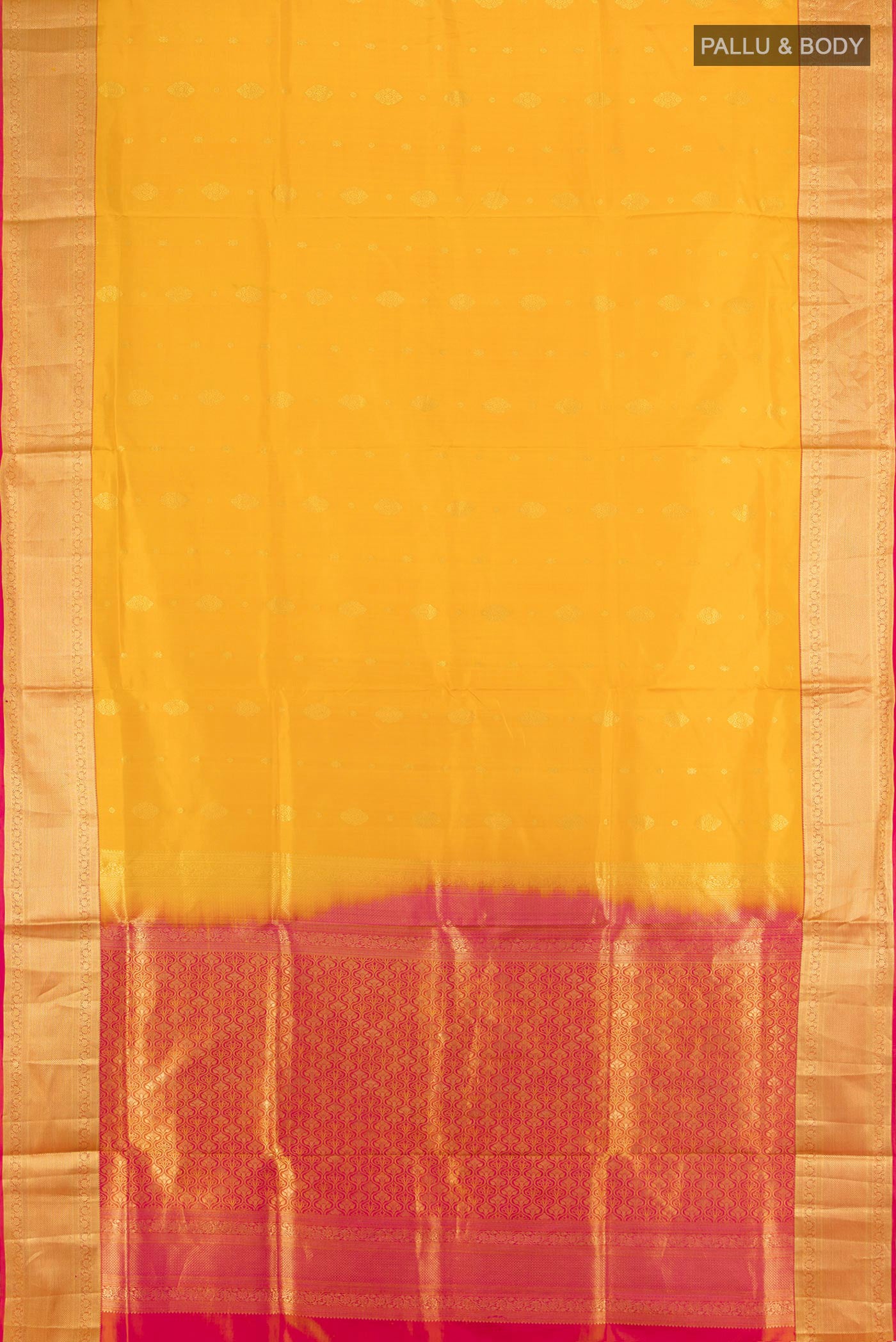 Flat view of Mustard Soft Silk Saree with Zari Butta on the body and Silk Border. 