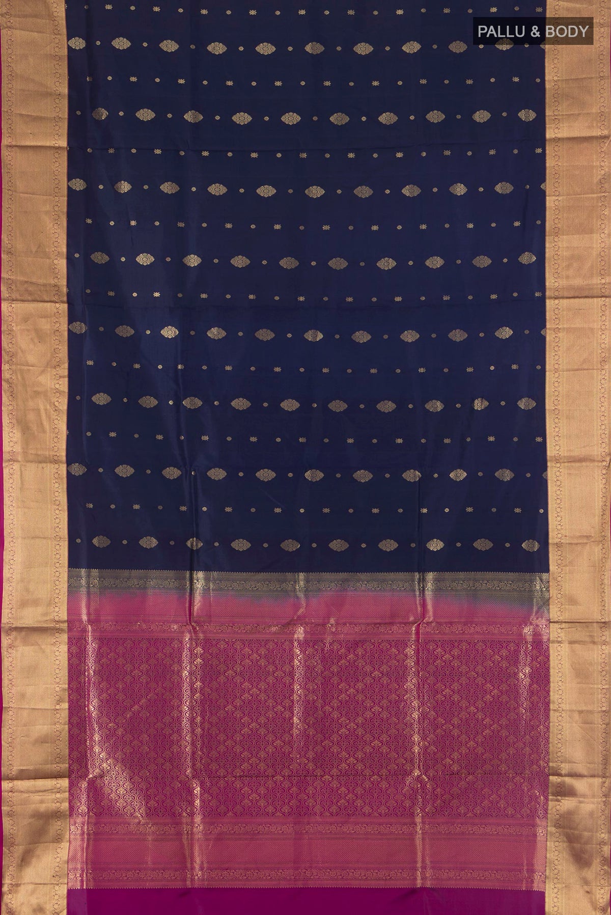 Flat view of Pure Silk Navy Blue Soft Saree with Zari Butta on the body and Zari Border. 