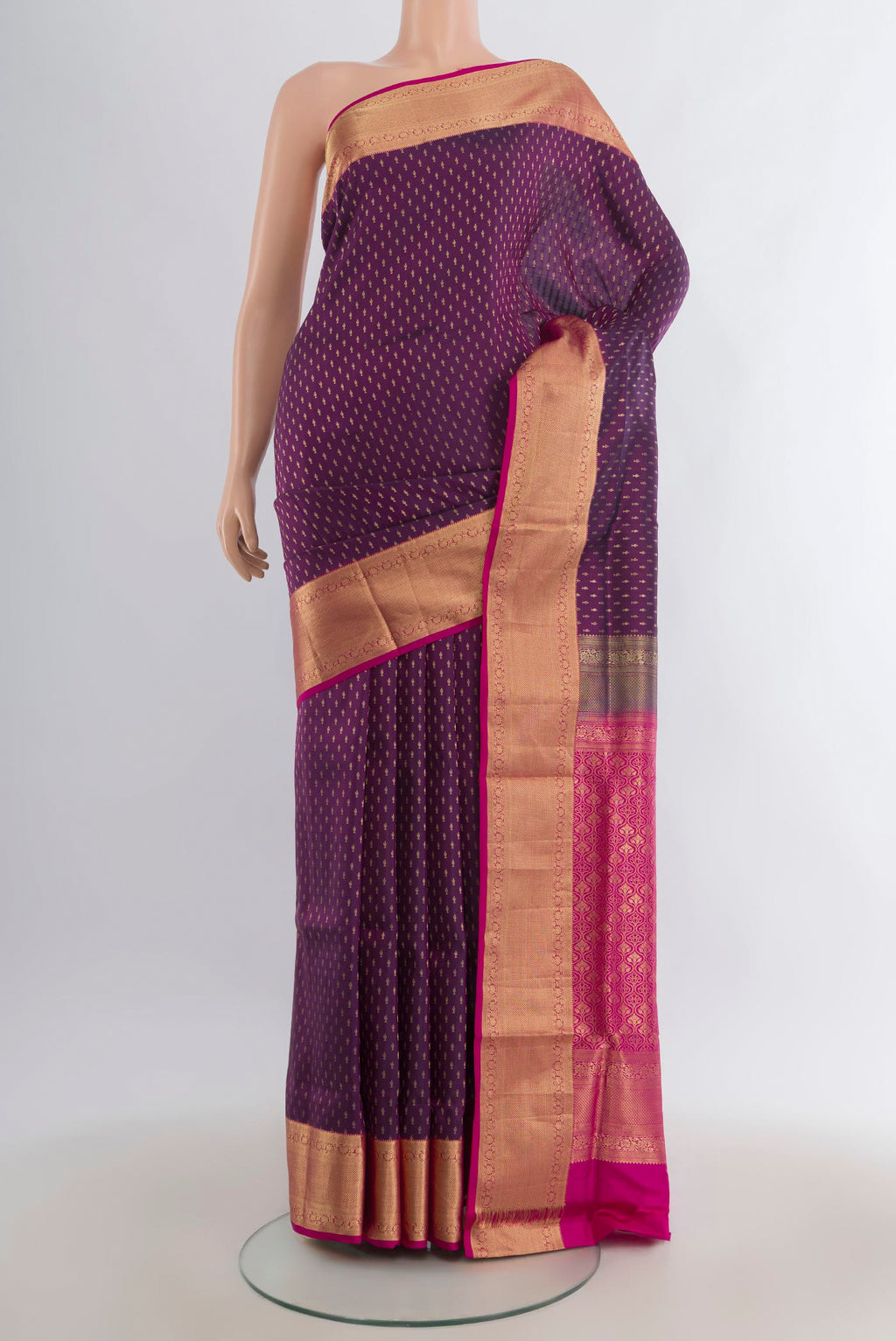 Pure Silk Purple Soft Saree with Zari Butta on the body and Zari Border.  displayed on a mannequin