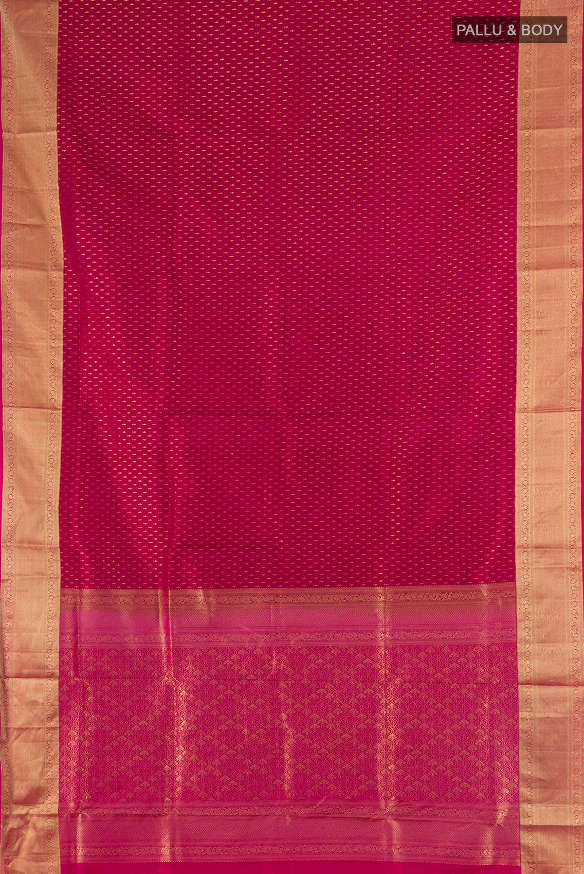 Flat view of Pure Silk Maroon Soft Saree with Zari Butta on the body and Zari Border. 