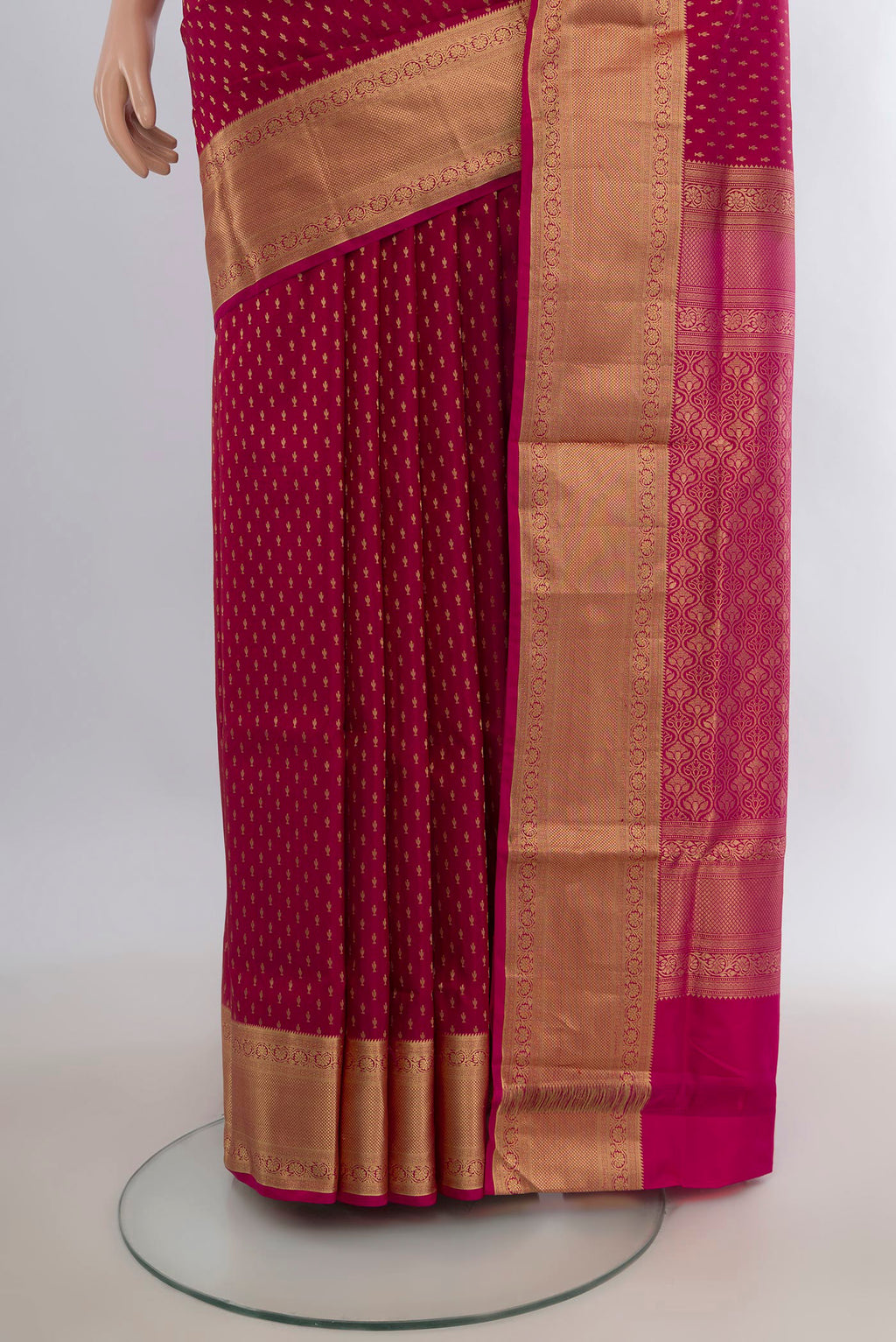 Pleats and pallu of Pure Silk Maroon Soft Saree with Zari Butta on the body and Zari Border. 