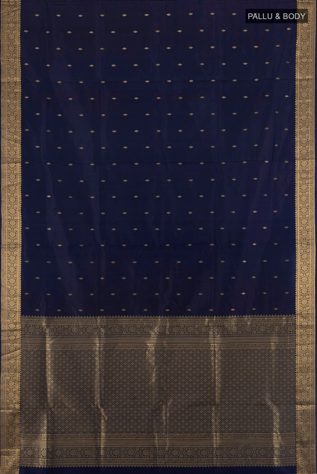 Flat view of Navy Blue Soft Silk Saree with Zari Butta on the body and Zari Border. 