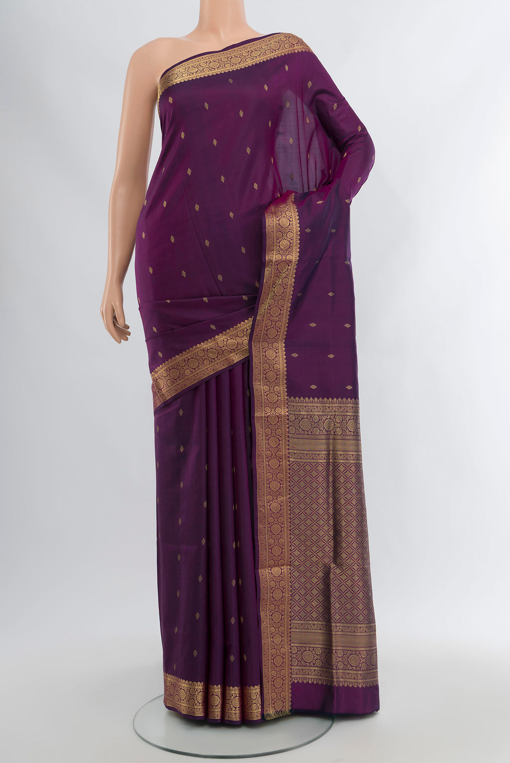 Purple Soft Silk Saree with Zari Butta on the body and Zari Border.  displayed on a mannequin