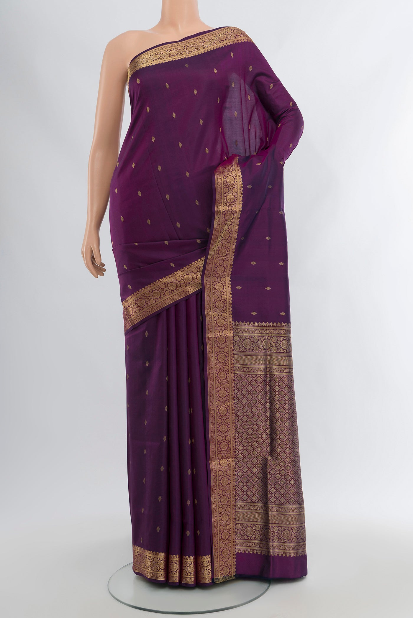 Purple Soft Silk Saree with Zari Butta on the body and Zari Border.  displayed on a mannequin