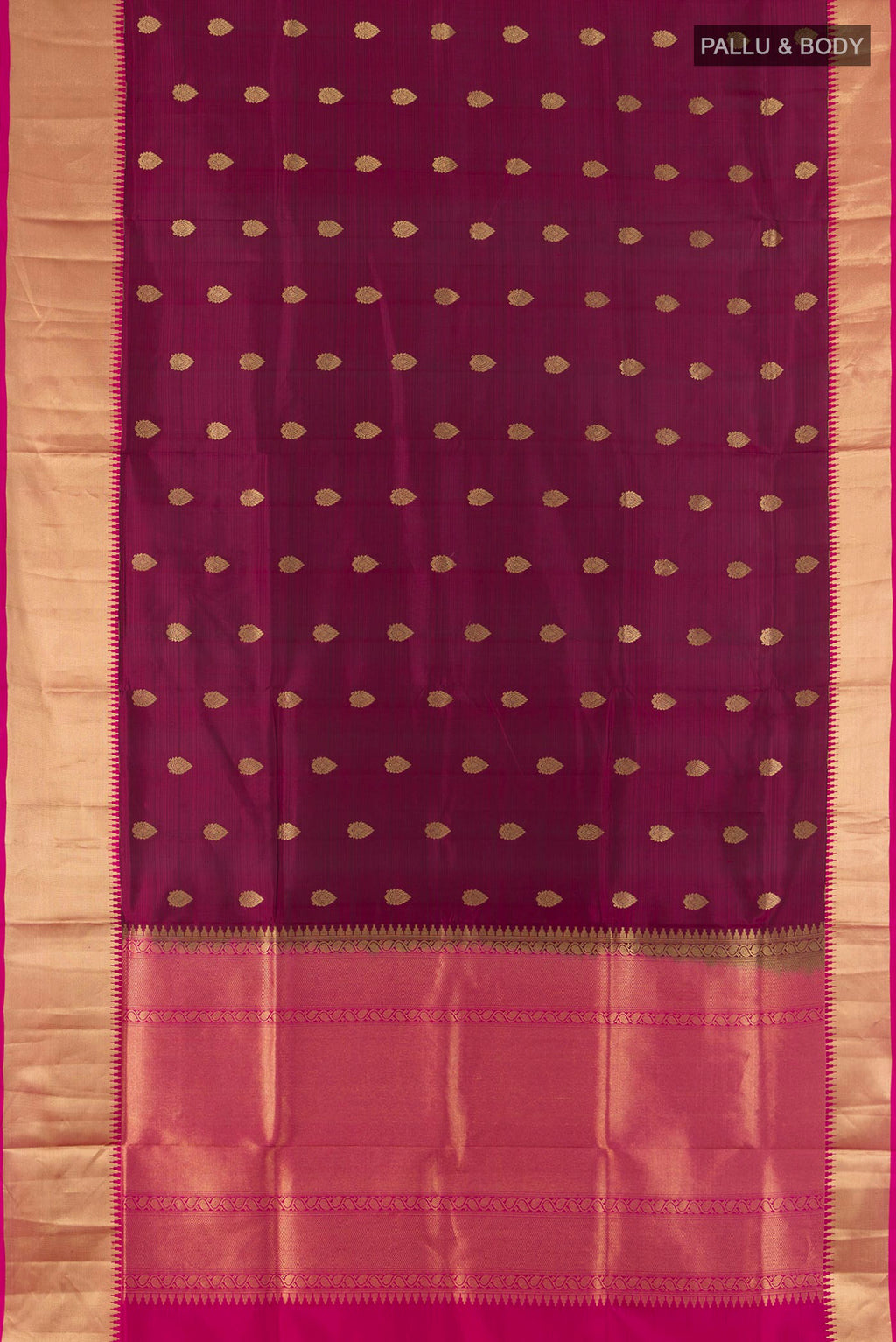 Flat view of Pure Silk Maroon Soft Saree with Zari Butta on the body and Zari Border. 