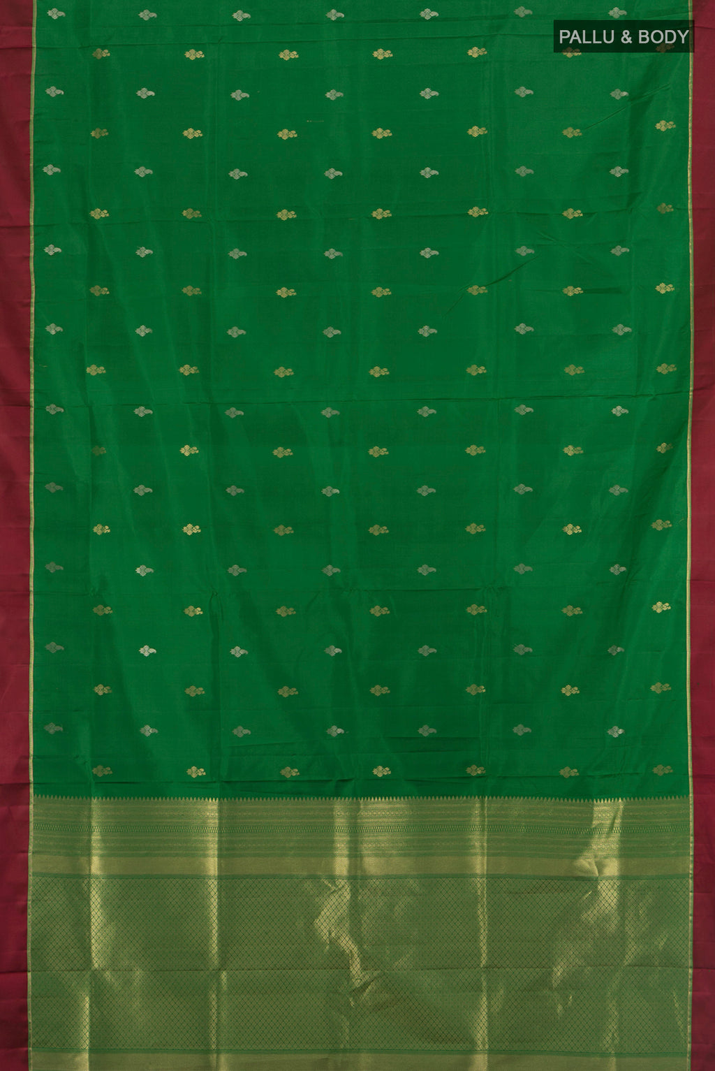 Flat view of Green Soft Silk Saree with Zari Butta on the body and Plain Border. 