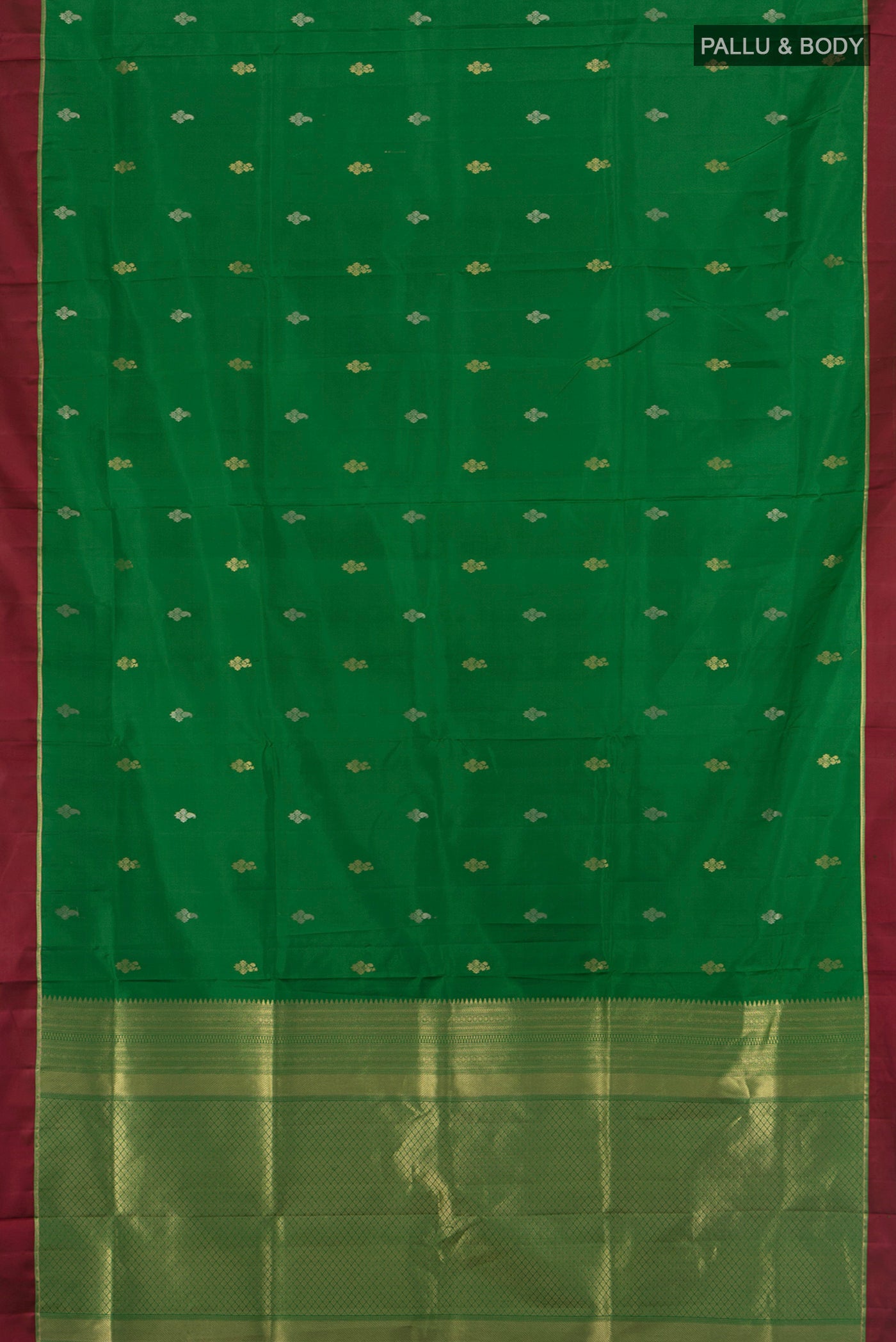 Flat view of Green Soft Silk Saree with Zari Butta on the body and Plain Border. 