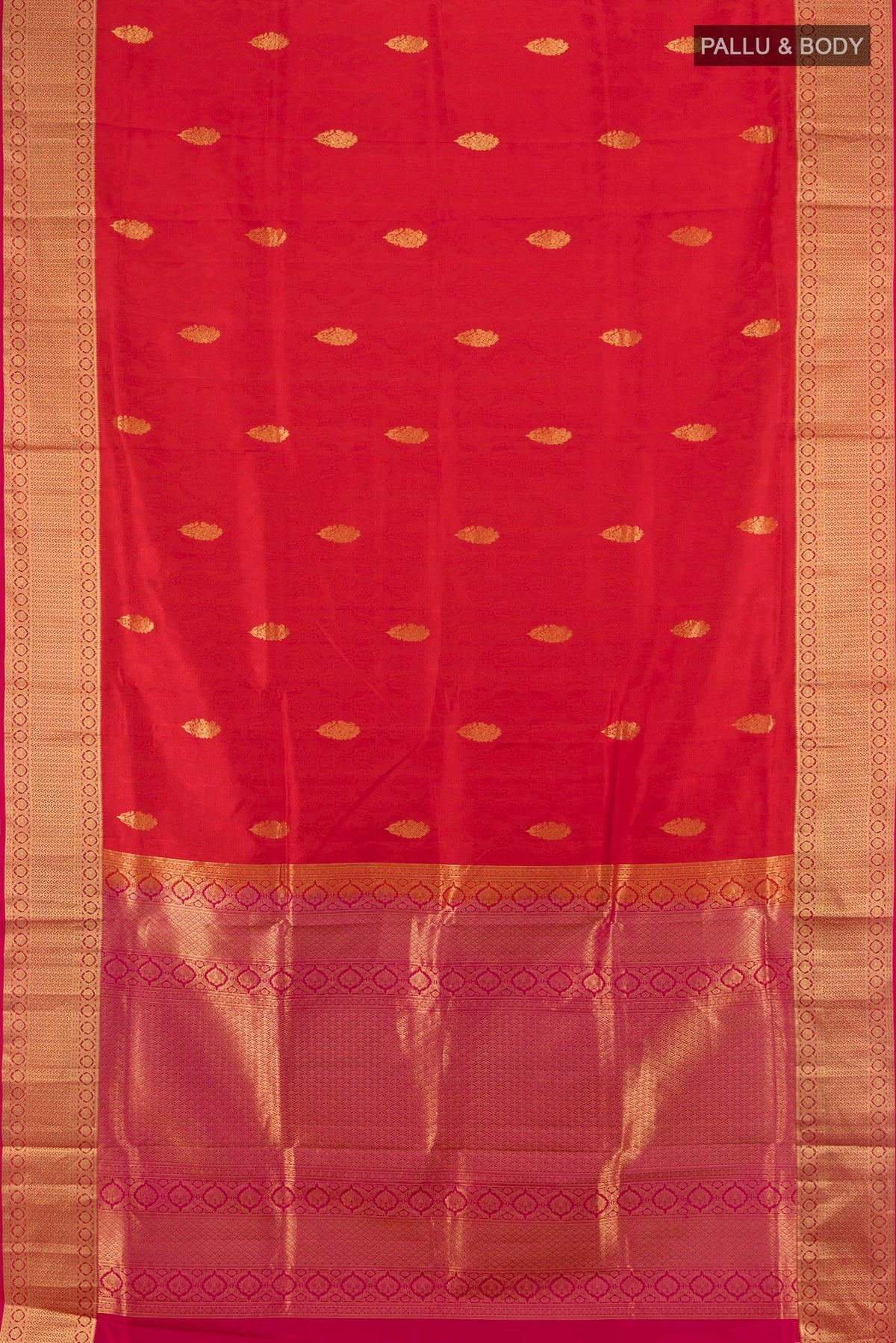 Flat view of Pure Silk Red Soft Saree with Zari Butta on the body and Zari Border. 