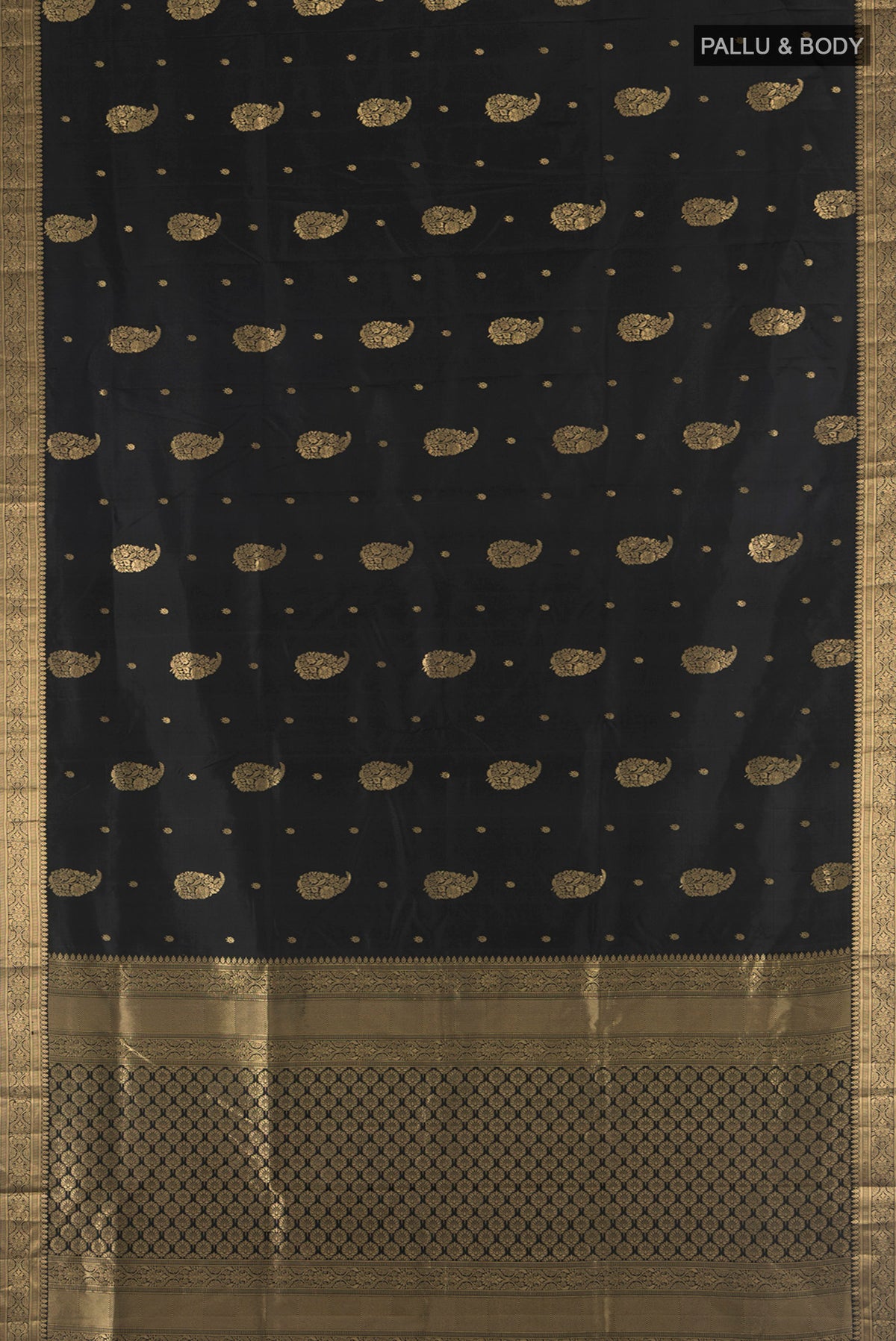 Flat view of Black Soft Silk Saree with Zari Butta on the body and Zari Border. 