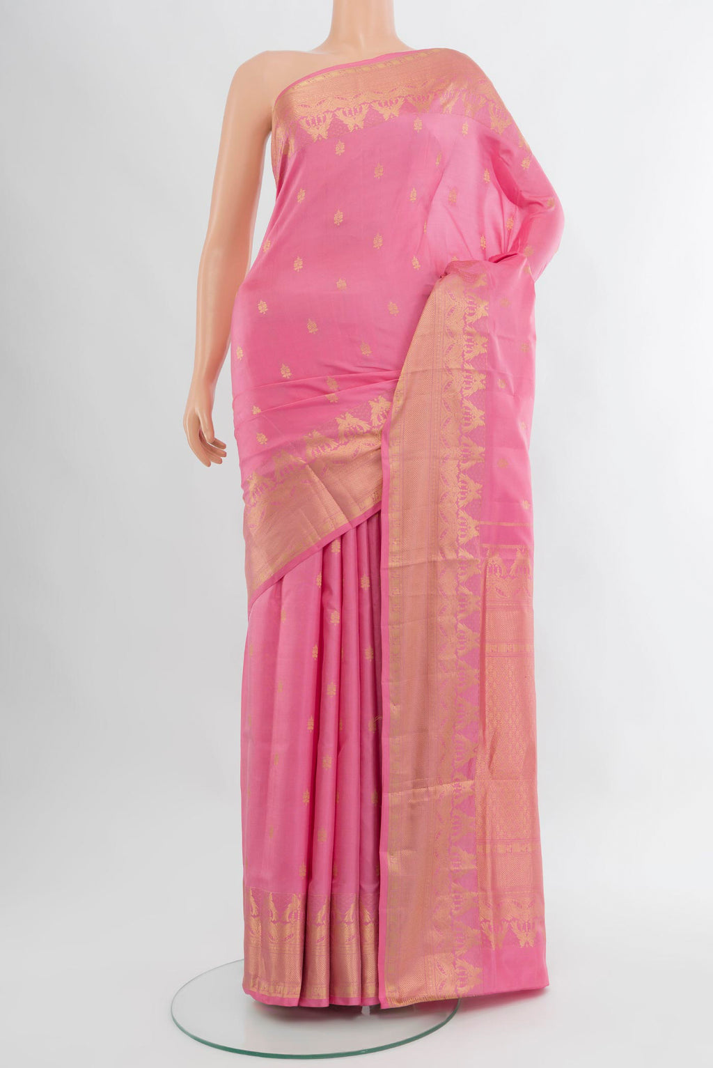 Rose pink Soft Silk Saree with Zari Butta on the body and Fancy Border.  displayed on a mannequin