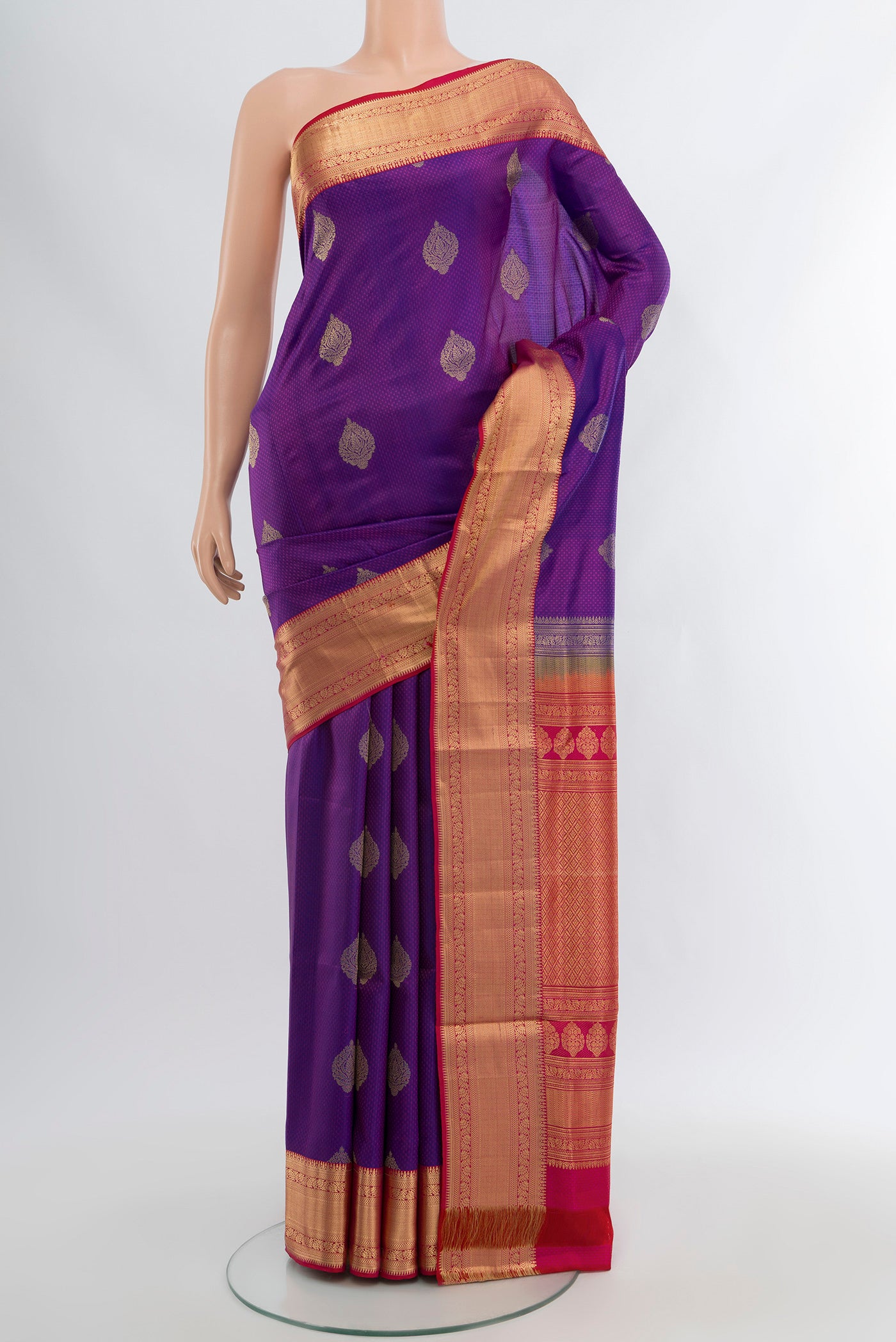 Purple Soft Silk Saree with Jacquard With Zari Butta on the body and Zari Border.  displayed on a mannequin