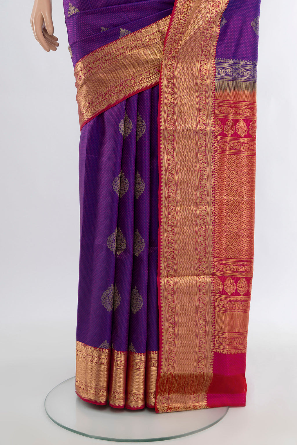 Pleats and pallu of Purple Soft Silk Saree with Jacquard With Zari Butta on the body and Zari Border. 