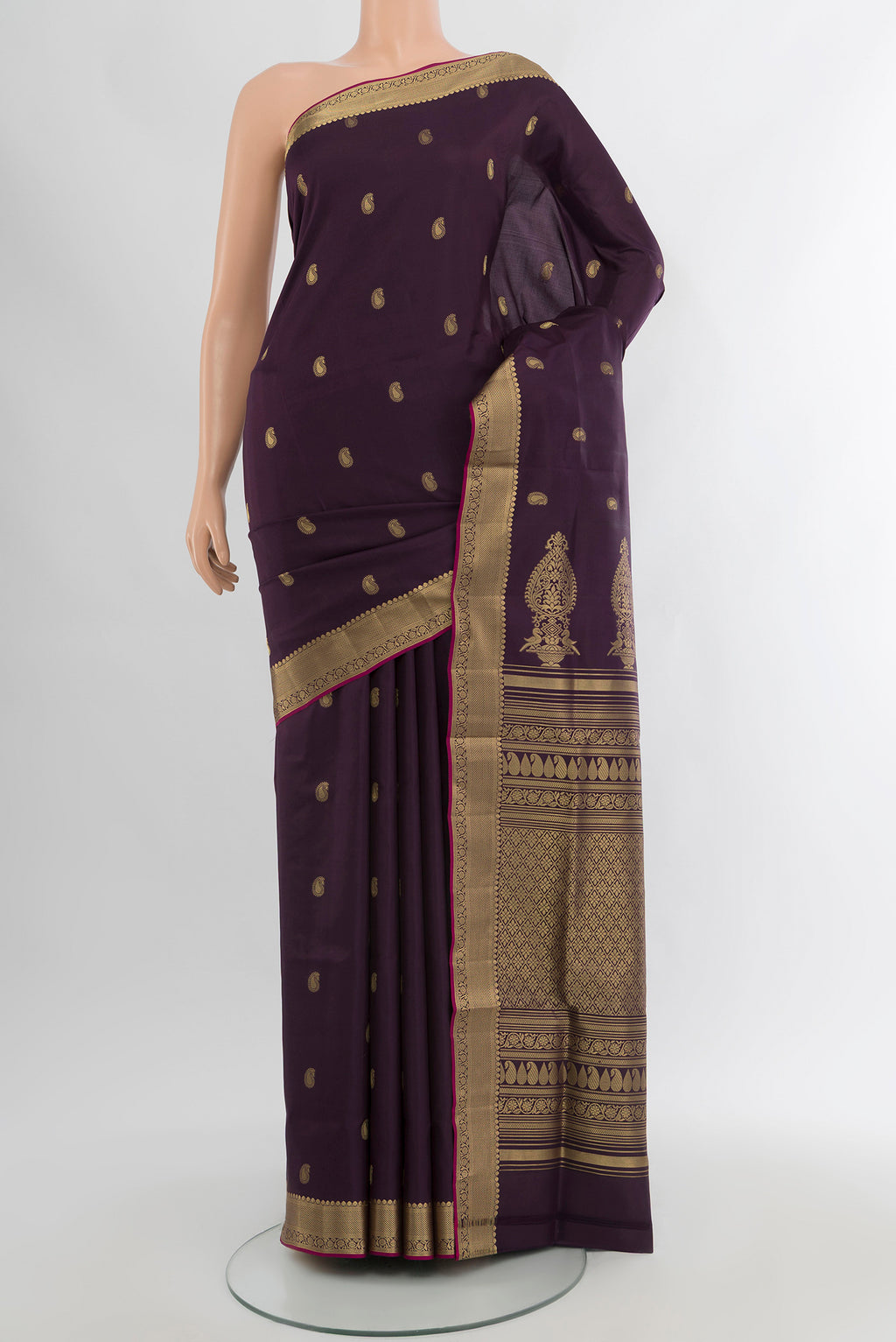 Violet Soft Silk Saree with Zari Butta on the body and Zari Border.  displayed on a mannequin
