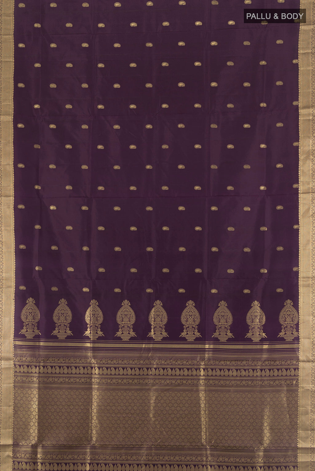 Flat view of Violet Soft Silk Saree with Zari Butta on the body and Zari Border. 