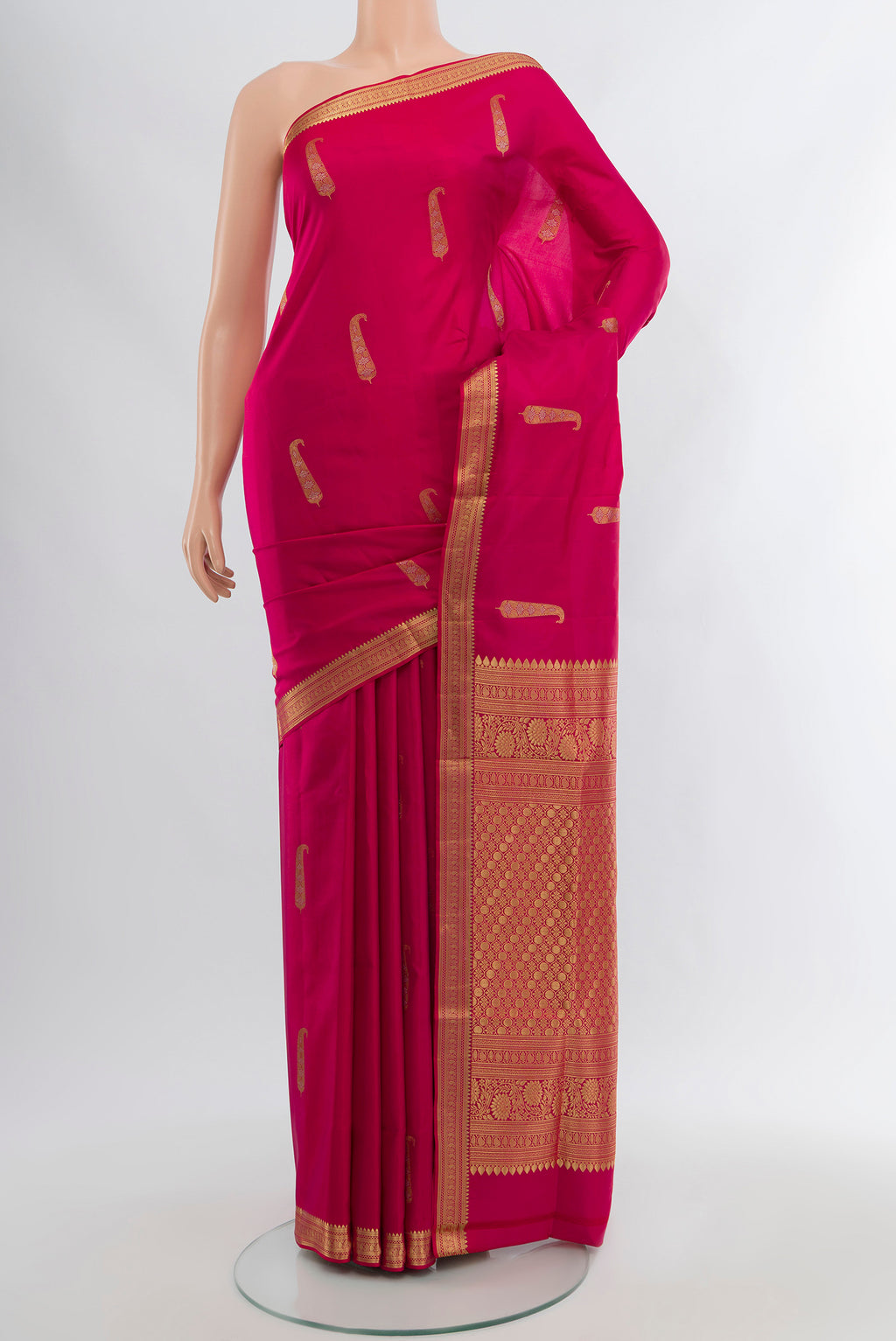 Pink Soft Silk Saree with Zari Butta on the body and Zari Border.  displayed on a mannequin