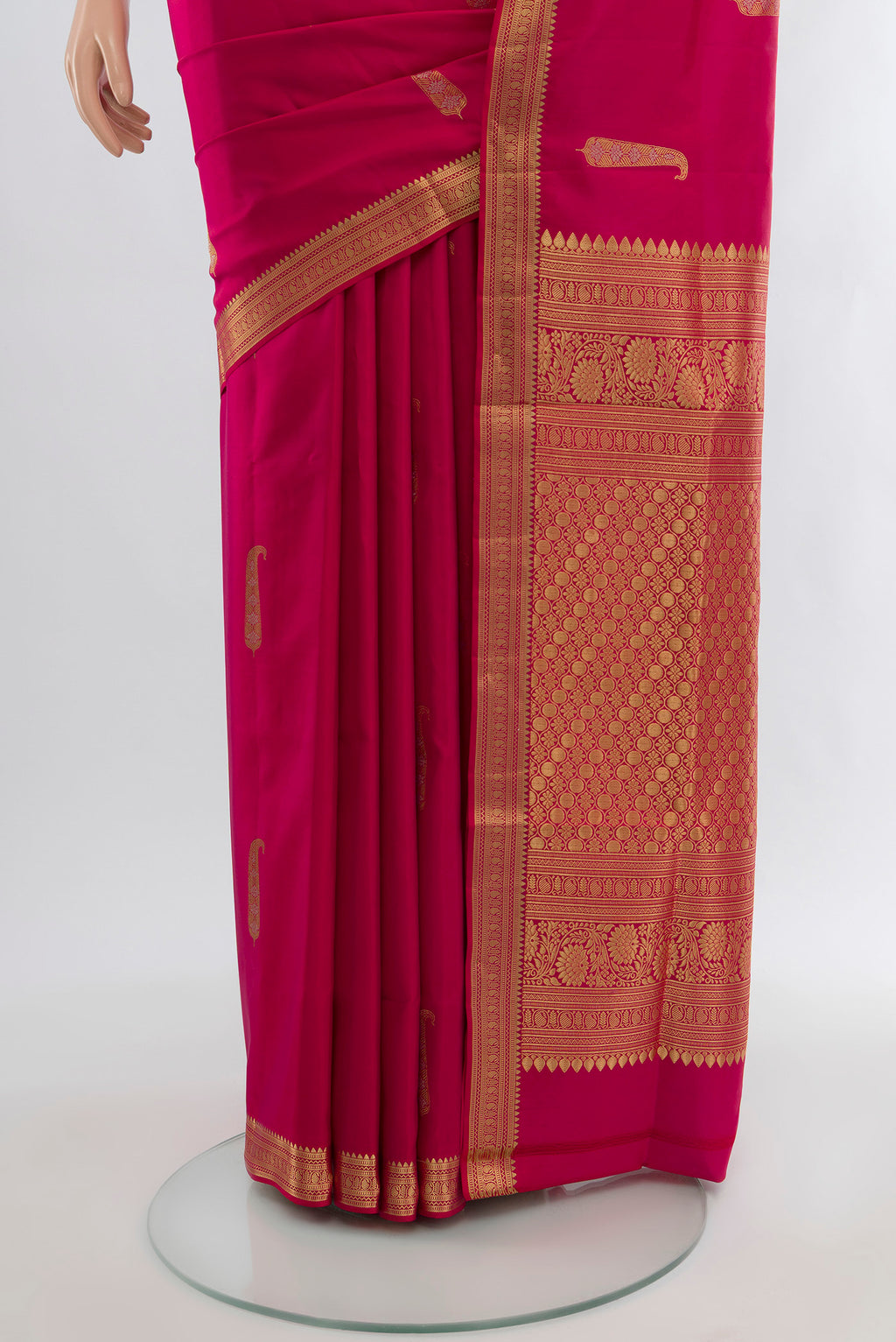 Pleats and pallu of Pink Soft Silk Saree with Zari Butta on the body and Zari Border. 