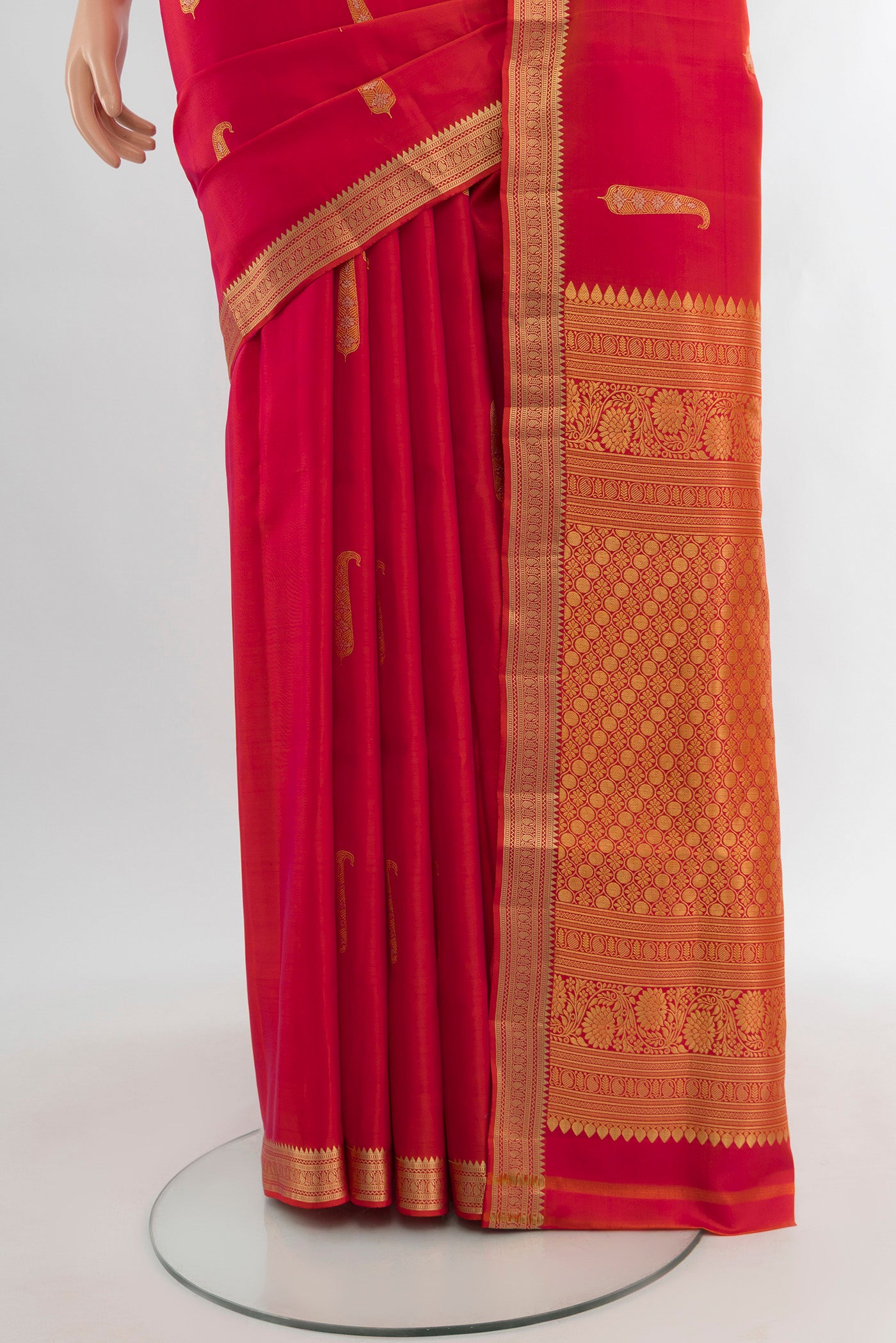 Pleats and pallu of Pink with orange Color Soft Silk Saree with Zari Butta on the body and Zari Border. 