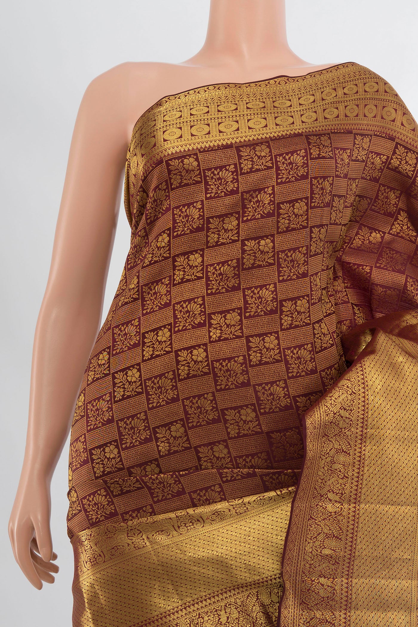 Border image of Pure Silk Pure Zari Coffee Brown Kanchipuram Saree with Zari Butta on the body and Silk Border. 