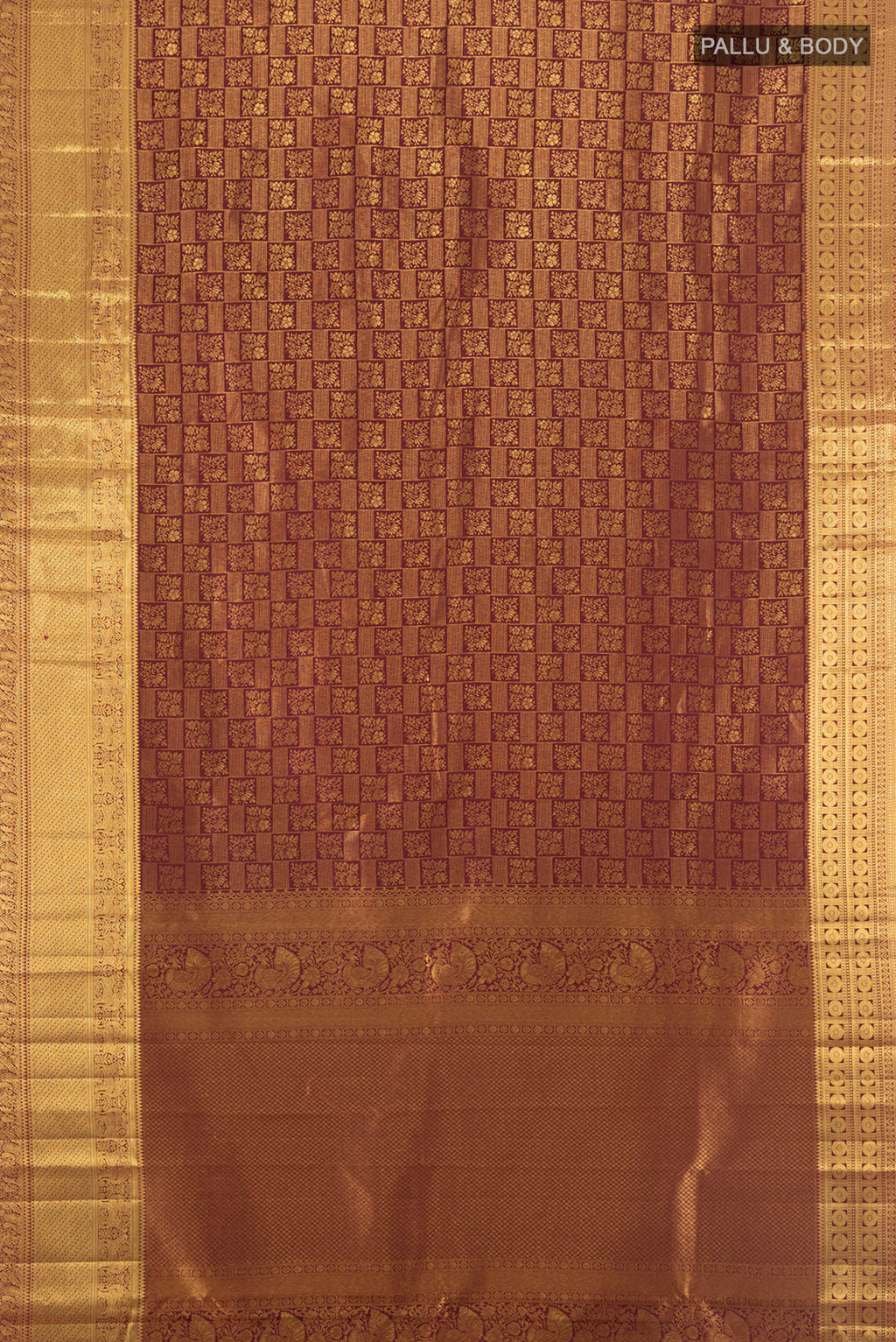 Flat view of Pure Silk Pure Zari Coffee Brown Kanchipuram Saree with Zari Butta on the body and Silk Border. 
