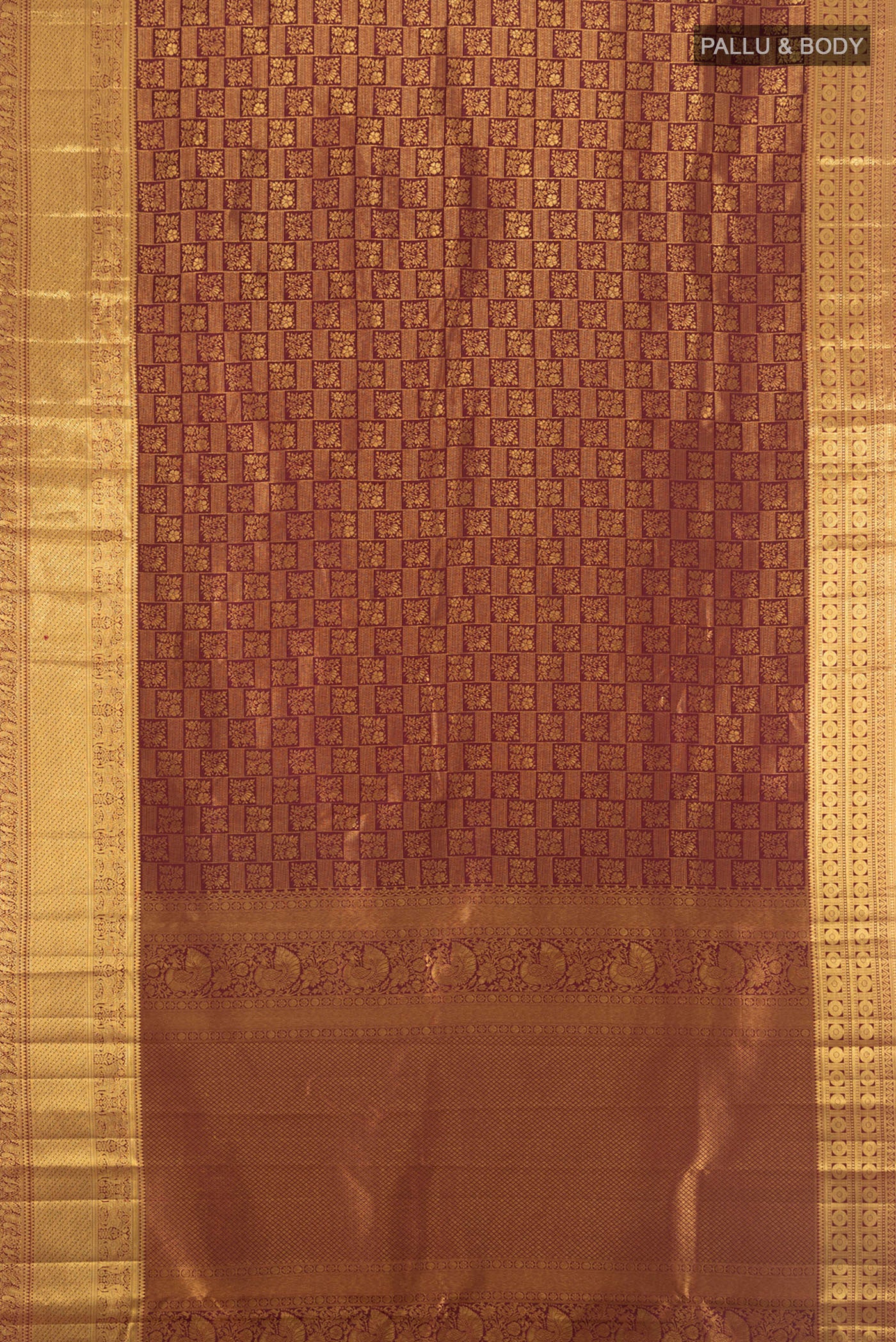 Flat view of Pure Silk Pure Zari Coffee Brown Kanchipuram Saree with Zari Butta on the body and Silk Border. 