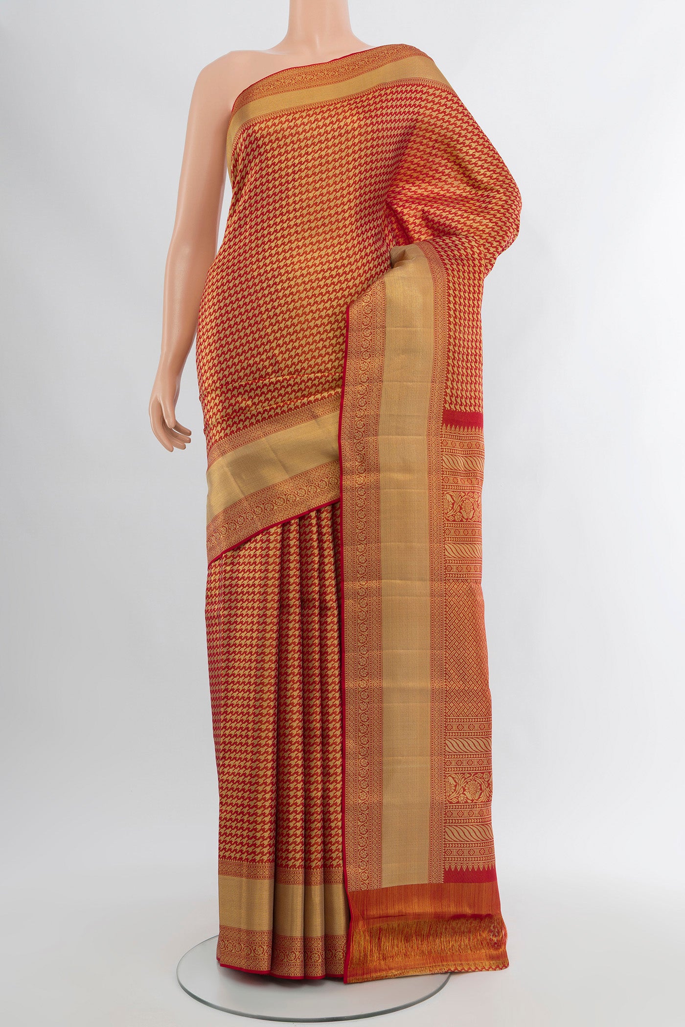 Red Kanjivaram Tissue Silk Saree with Zari Brocade on the body and Zari Border.  displayed on a mannequin