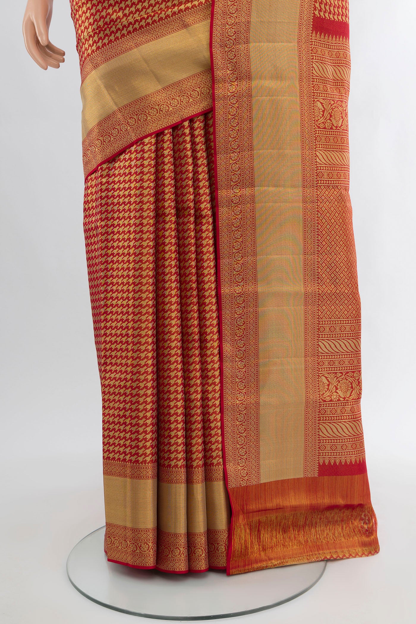 Pleats and pallu of Red Kanjivaram Tissue Silk Saree with Zari Brocade on the body and Zari Border. 
