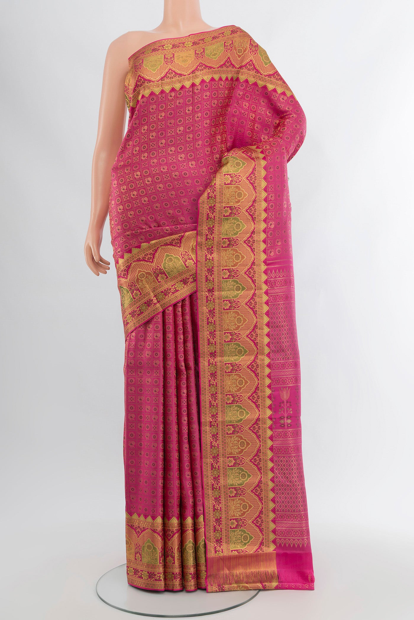 Pink Kanjivaram Silk Saree with Zari Brocade on the body and Zari Border.  displayed on a mannequin