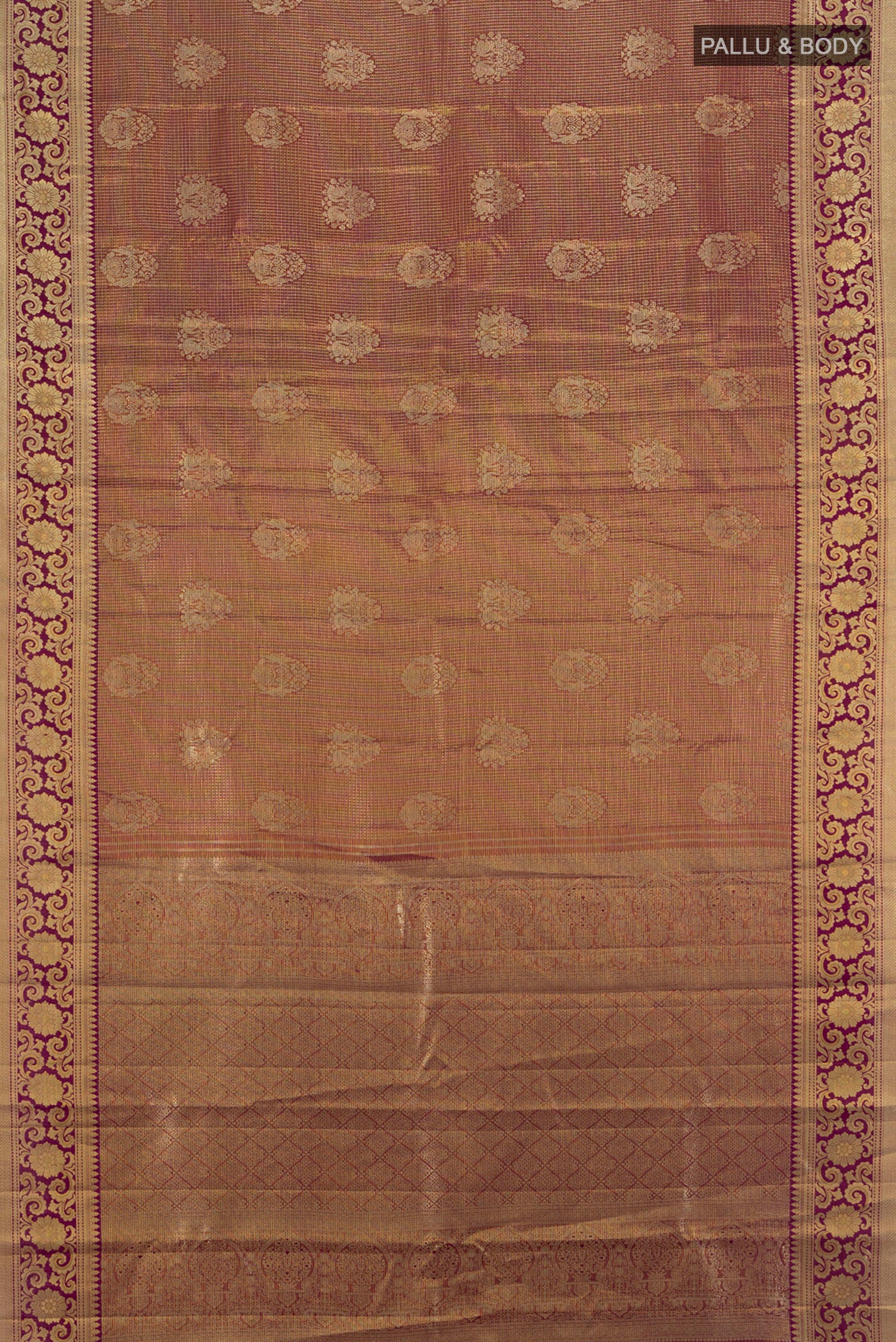 Flat view of Purple Kanjivaram Tissue Silk Saree with Zari Brocade on the body and Zari Border. 