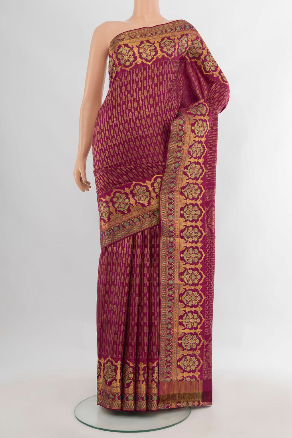 Pure Silk Magenta Kanjivaram Saree with Zari Brocade on the body and Zari Border.  displayed on a mannequin