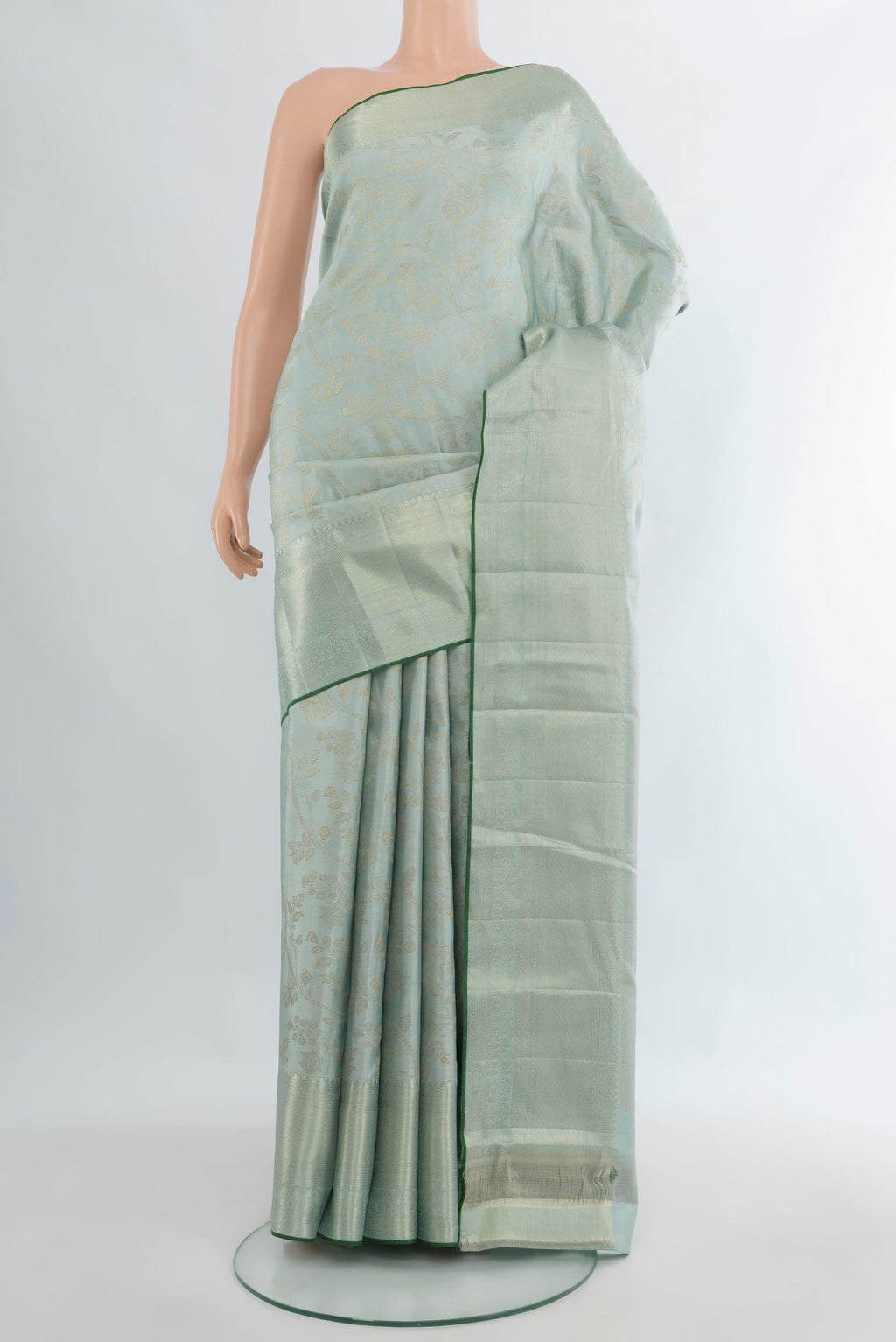 Pure Silk Light Blue Kanjivaram Saree with Zari Brocade on the body and Zari Border.  displayed on a mannequin