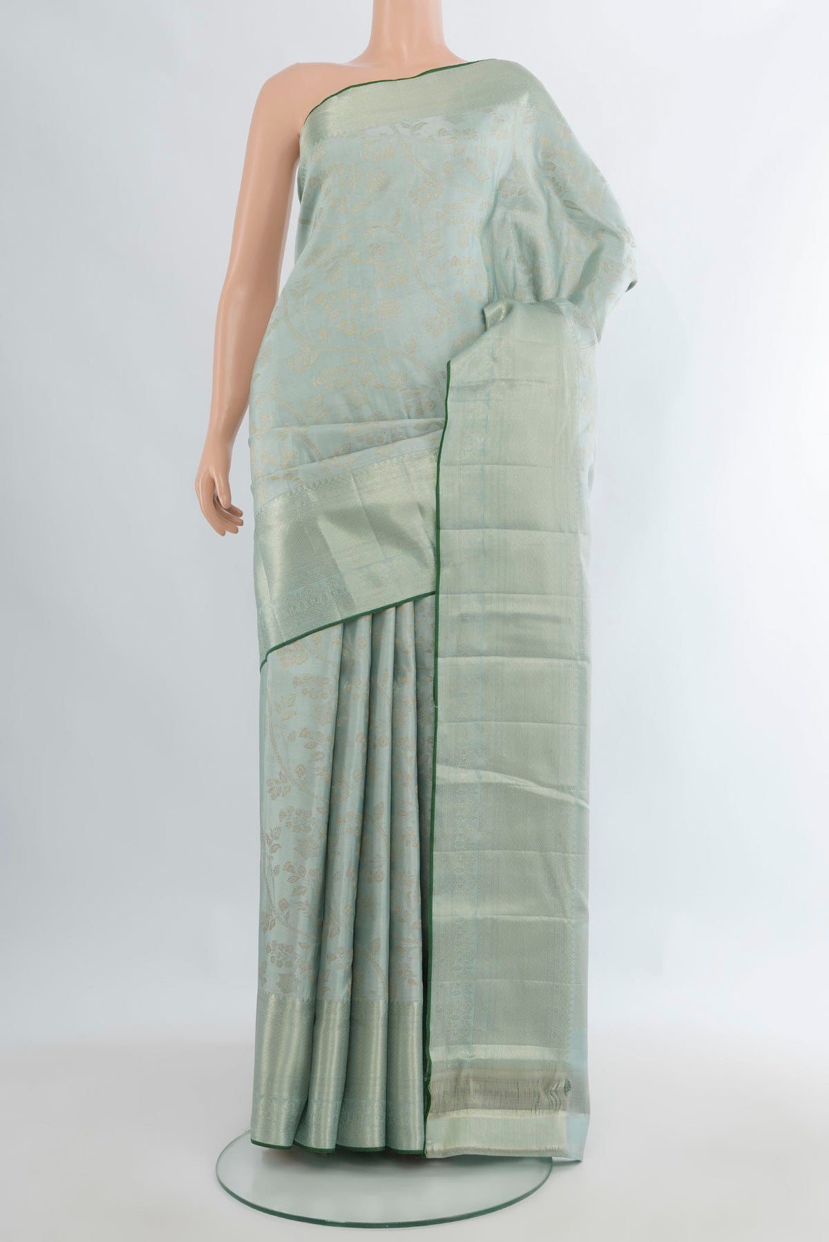 Pure Silk Light Blue Kanjivaram Saree with Zari Brocade on the body and Zari Border.  displayed on a mannequin