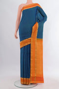 Pure Silk Blue Kanjivaram Saree with Checked design on the body and Zari Border.  displayed on a mannequin