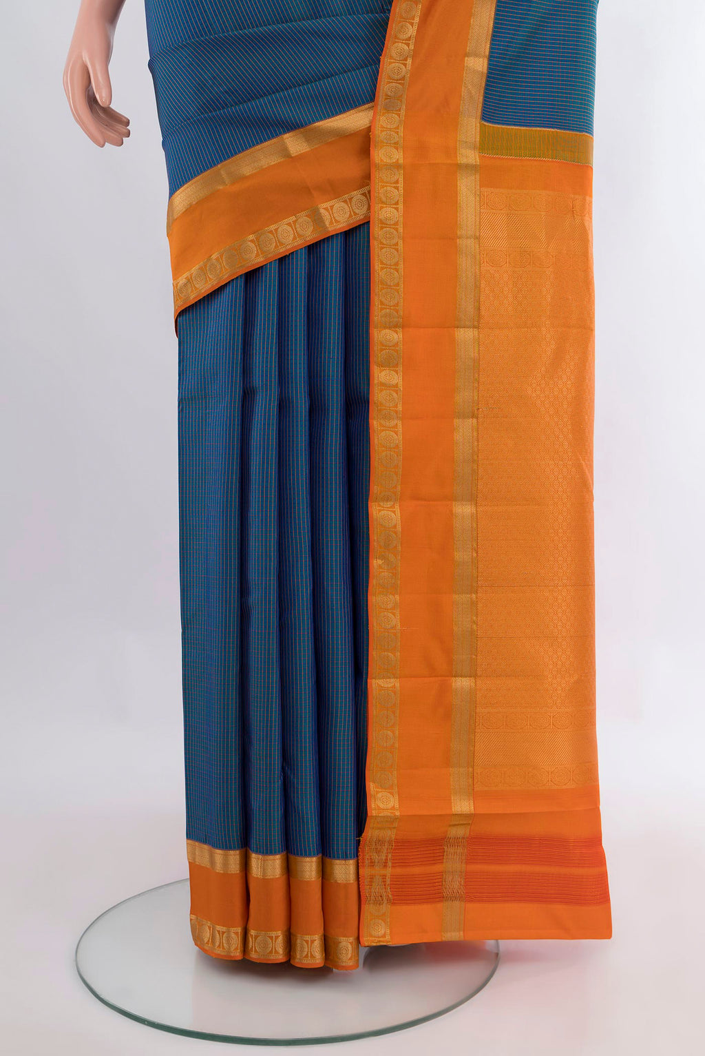 Pleats and pallu of Pure Silk Blue Kanjivaram Saree with Checked design on the body and Zari Border. 