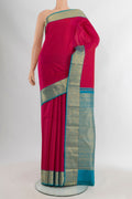 Pink Kanchipuram Silk Saree with Stripes on the body and Zari Border.  displayed on a mannequin