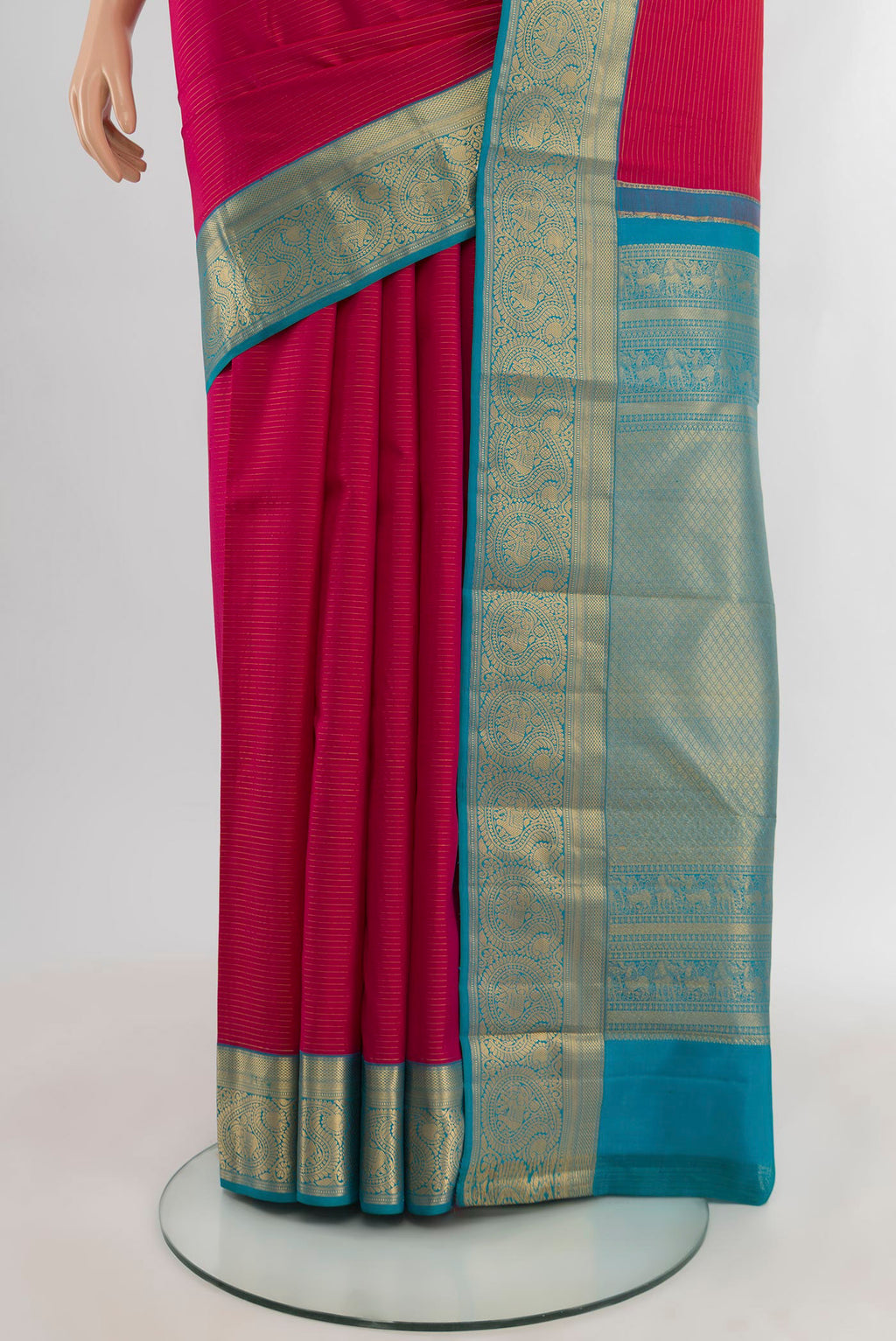 Pleats and pallu of Pink Kanchipuram Silk Saree with Stripes on the body and Zari Border. 