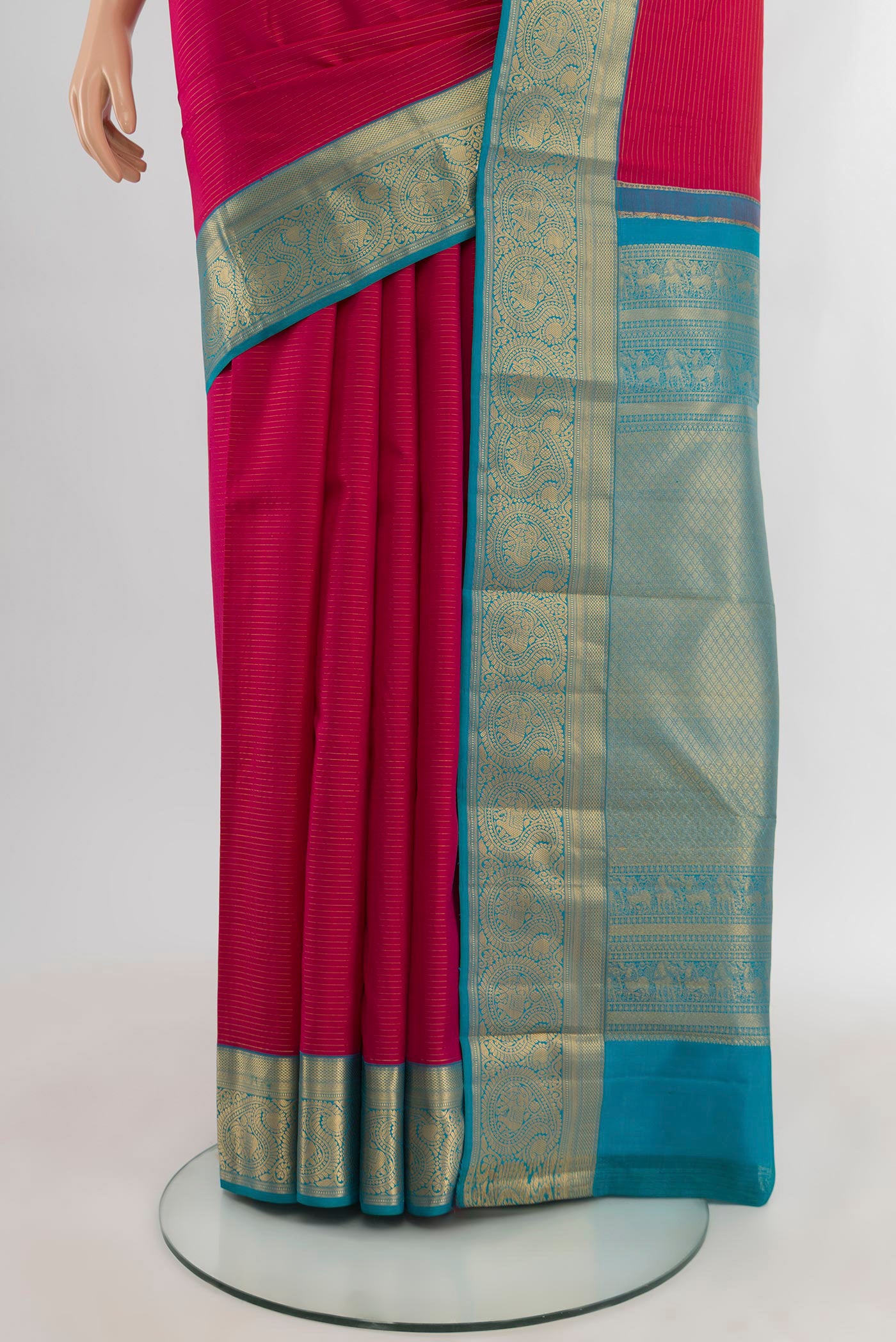 Pleats and pallu of Pink Kanchipuram Silk Saree with Stripes on the body and Zari Border. 
